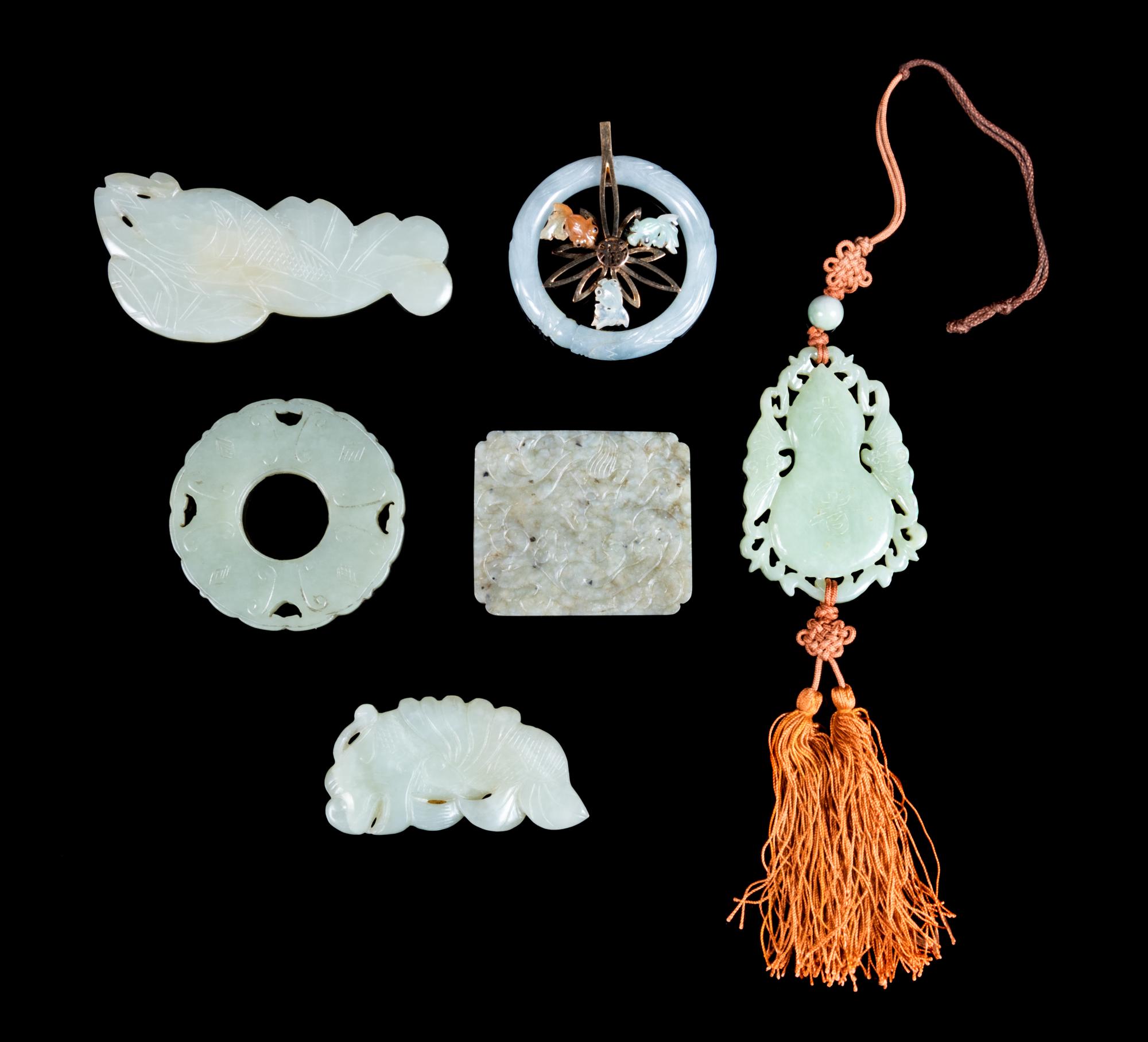 Six Chinese Carved Jade Pendants Length of largest 3 5/8 inches. — LATE 19TH/20TH CENTURY