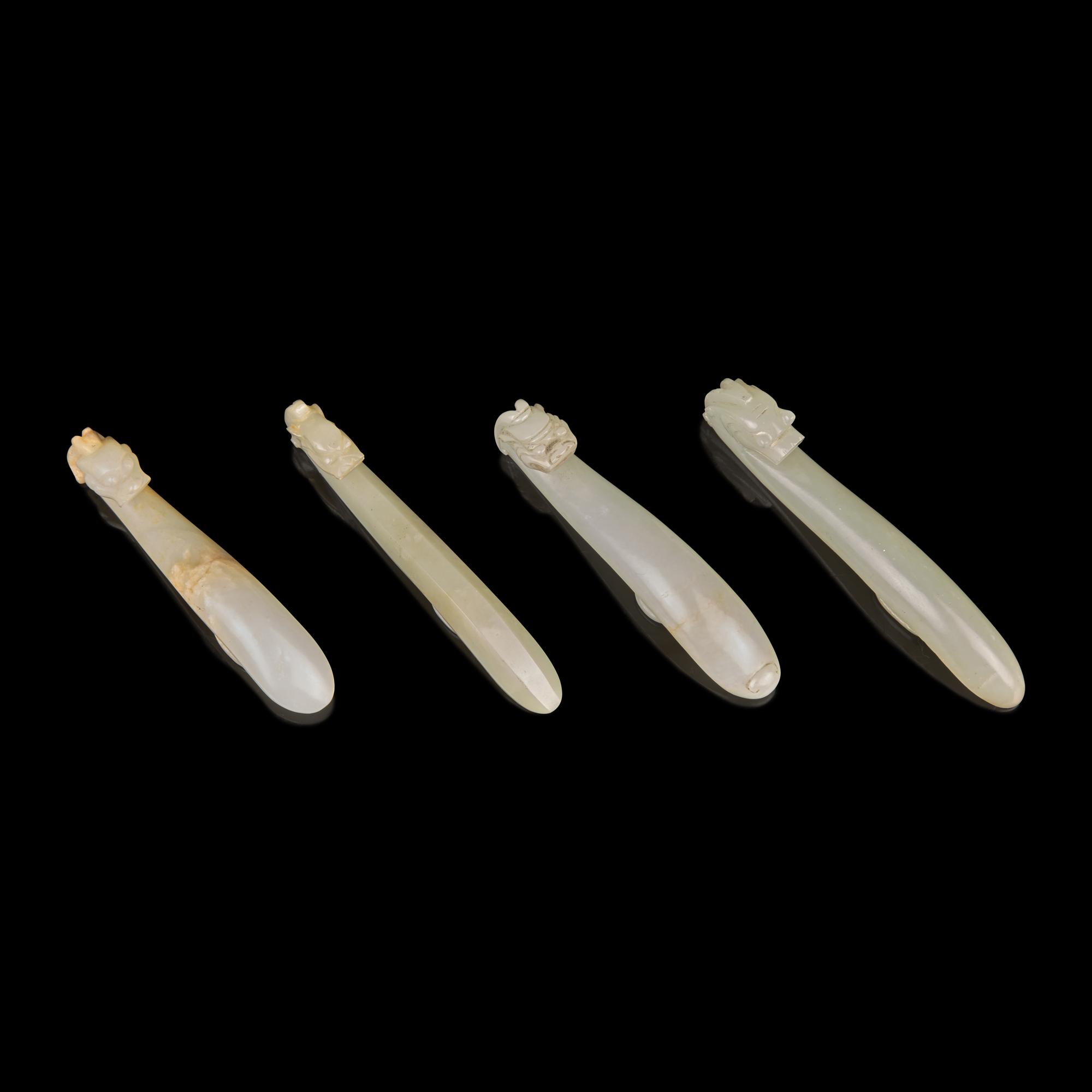 Four Pale Celadon Jade "Dragon" Belthooks, Qing Dynasty 清 青玉龍鉤四件