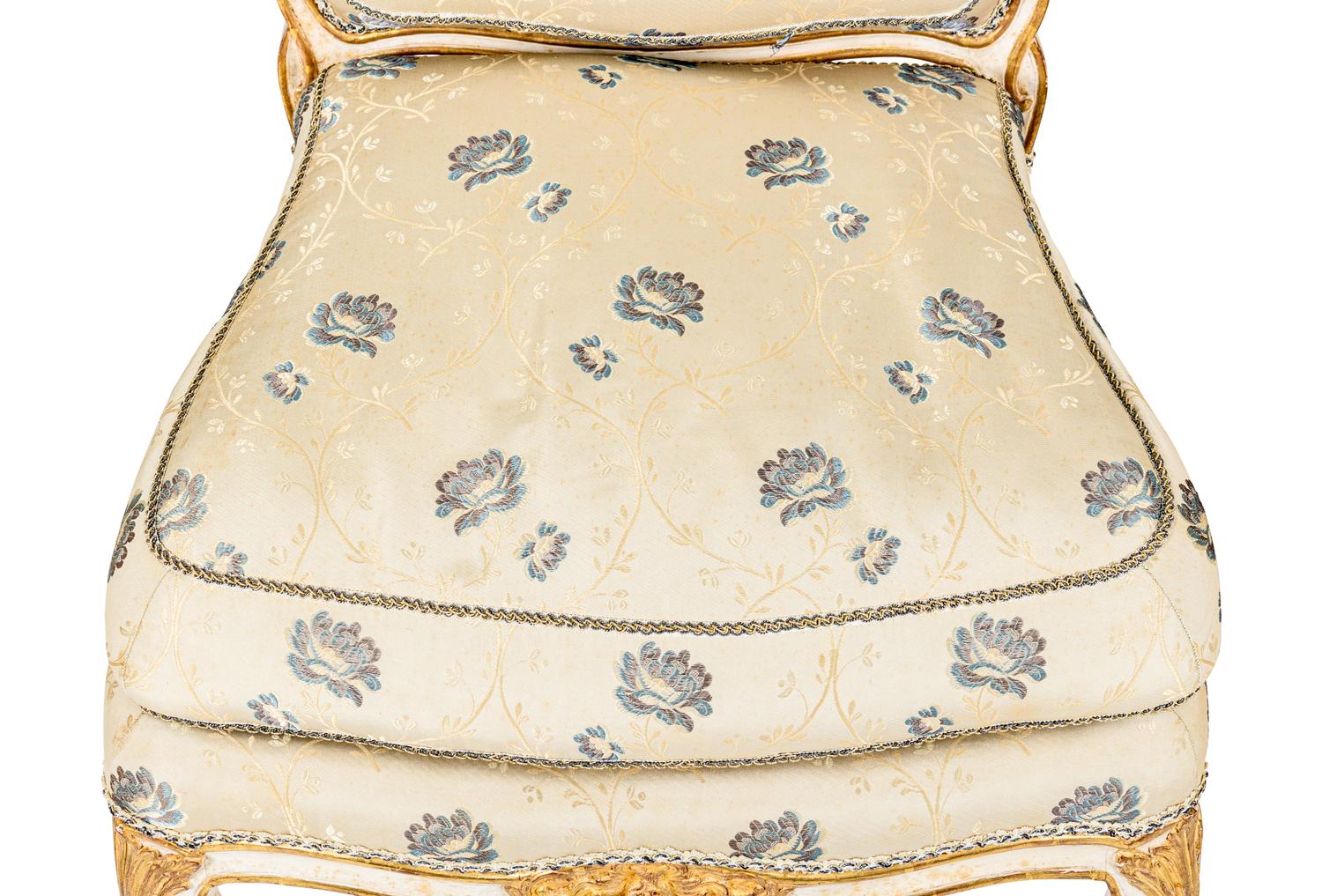 A Pair of Louis XV White-Painted and Parcel-Gilt Side Chairs