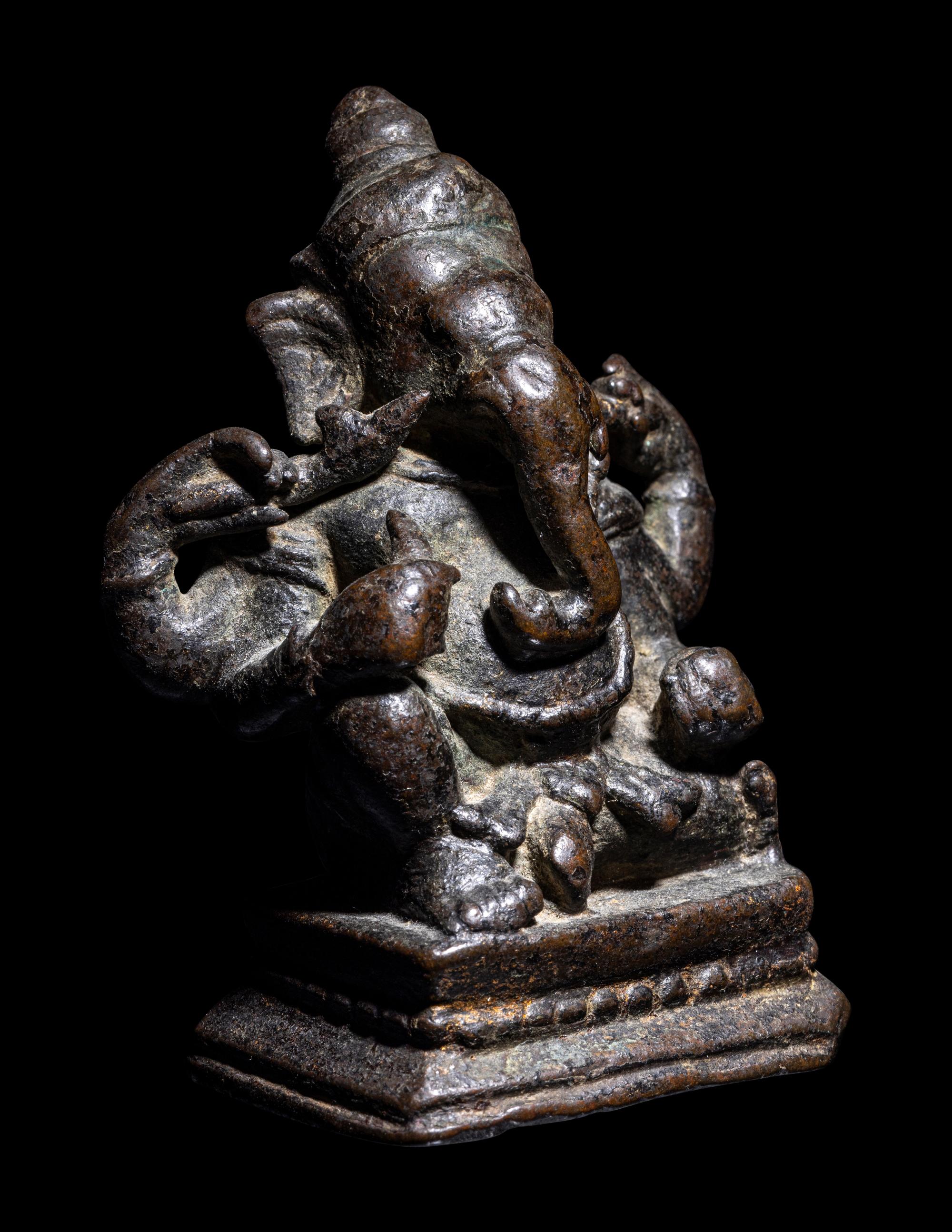 An Indian Bronze Figure of Ganesha