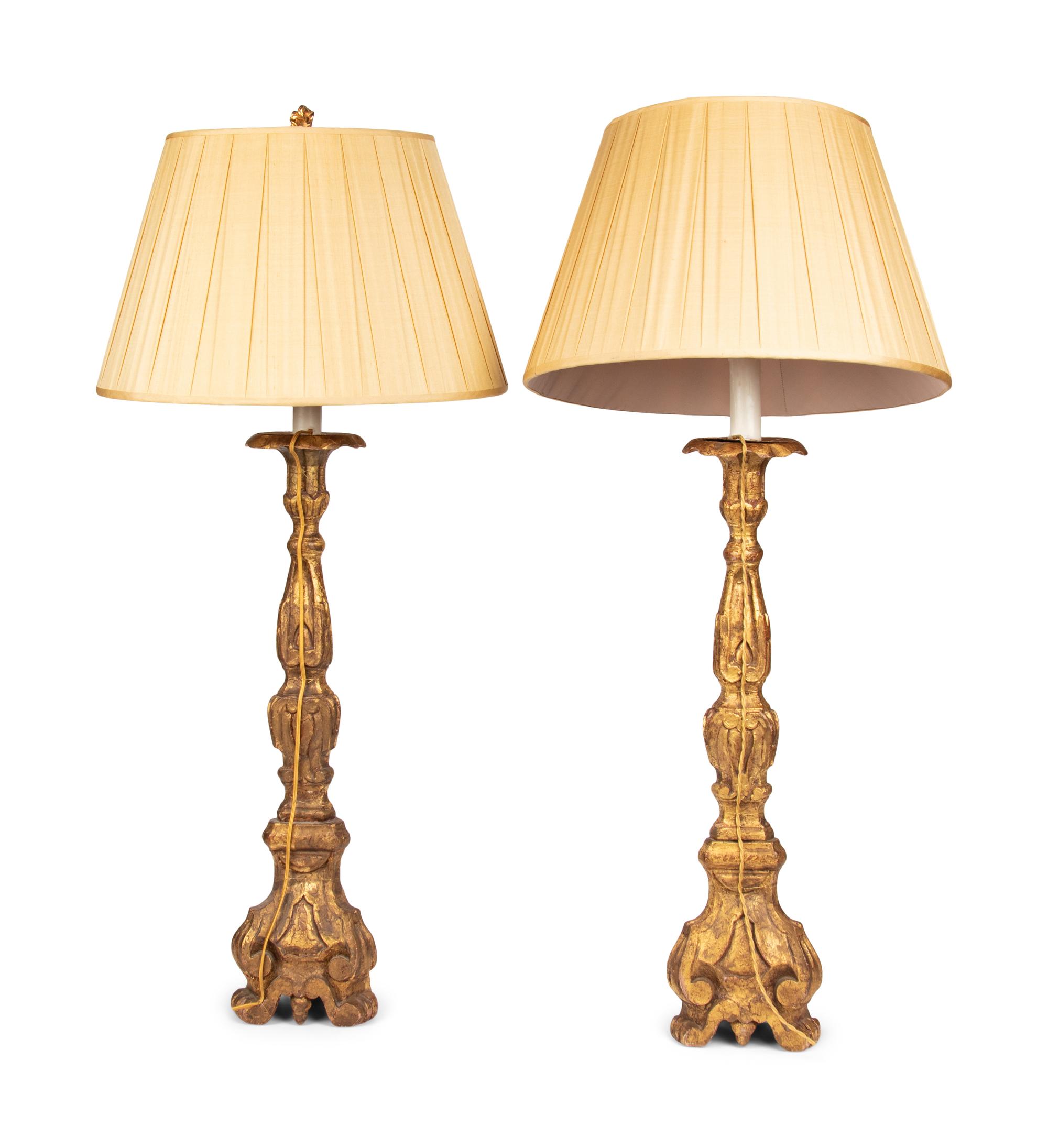 A Pair of Italian Giltwood Prickets Mounted as Lamps