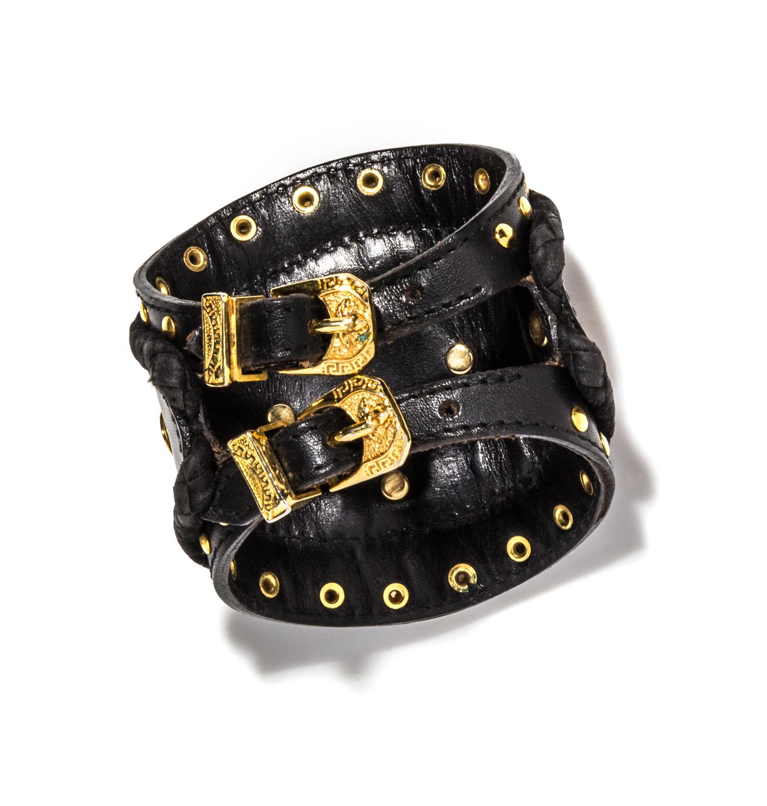 A Gianni Versace Black Leather Cuff, Width: 3.5"; Circumference: 6.5"- 7.25".