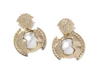 A Pair of Gianni Versace Faux Pearl and Medusa Earclips, 2" x 3".