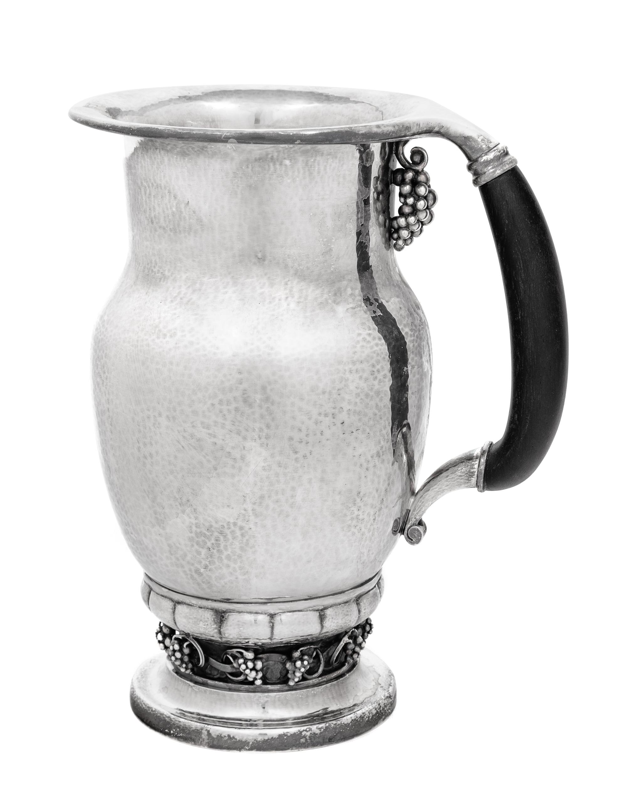 A Georg Jensen Silver Grape Pattern Pitcher