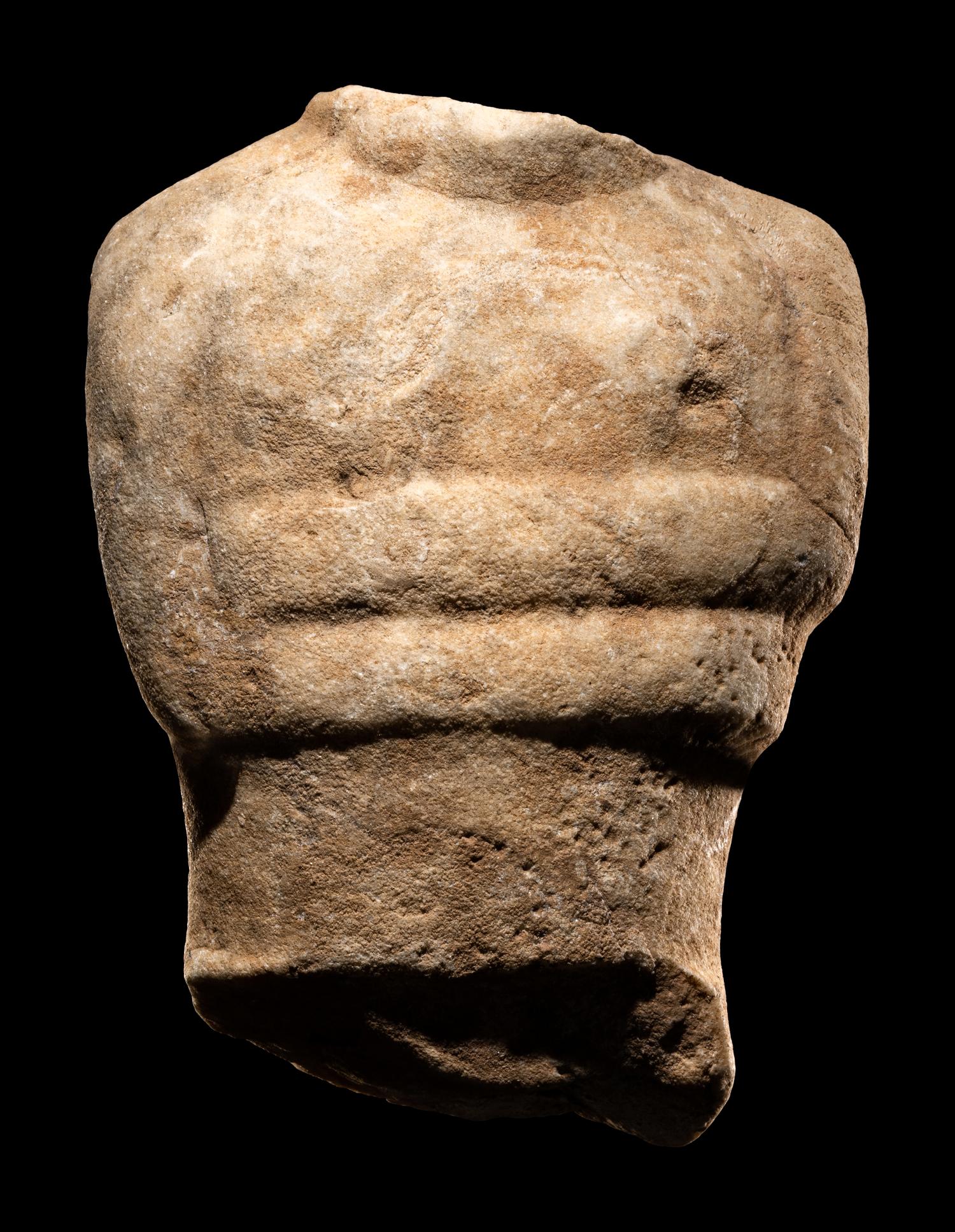 A Cycladic Marble Torso