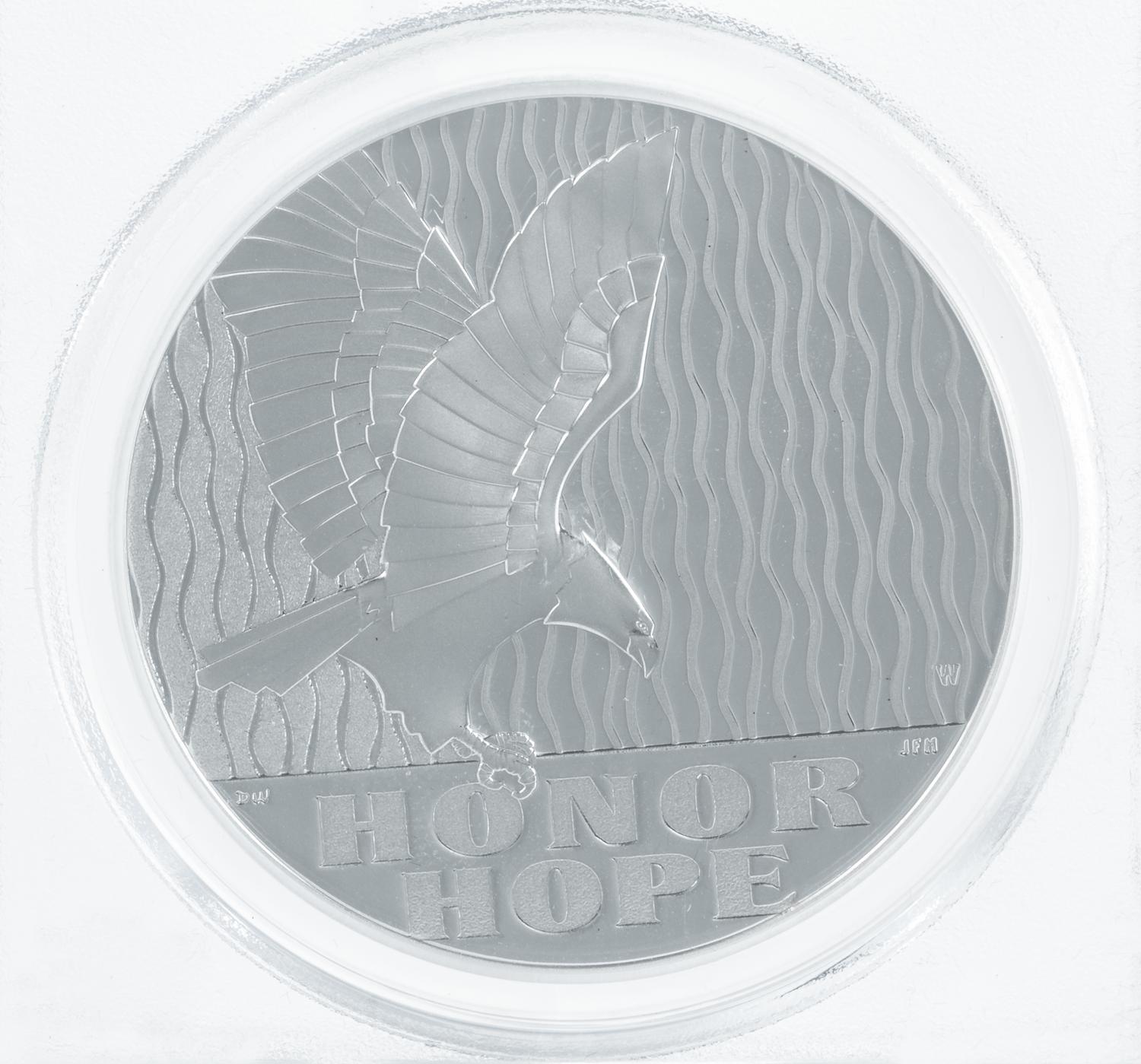 A Pair of United States 2011-W September 11, 2001 Memorial Limited Edition First Strike 1 Oz. Silver Medals