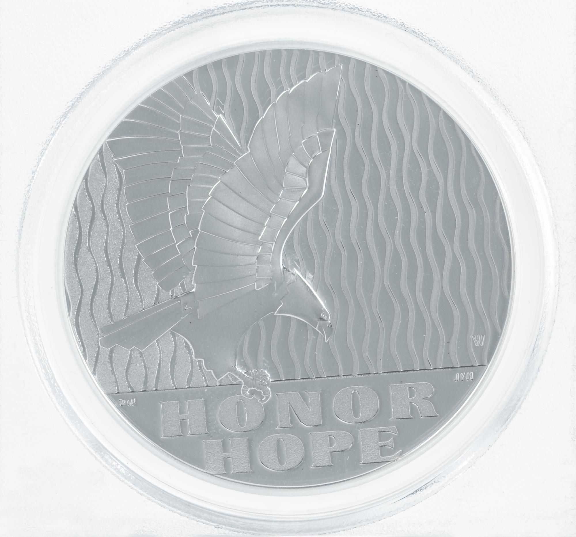 A Pair of United States 2011-W September 11, 2001 Memorial Limited Edition First Strike 1 Oz. Silver Medals