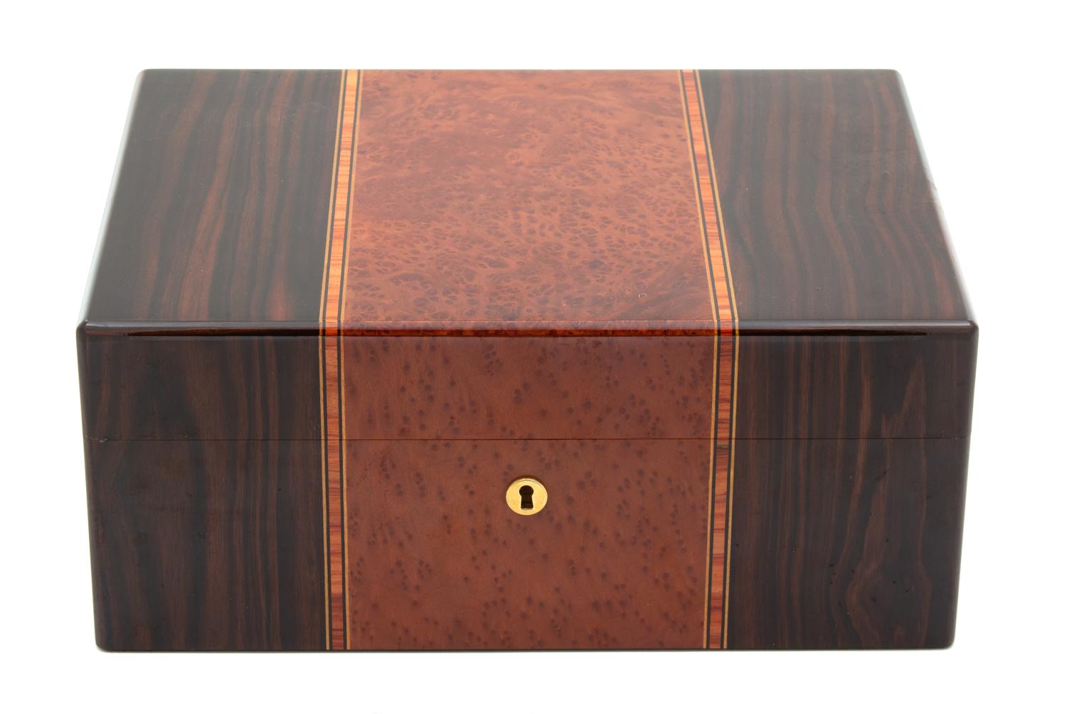 Three Wood Humidors Height of largest 5 1/4 x width 12 1/8 x depth 9 1/8 inches. — 20TH CENTURY