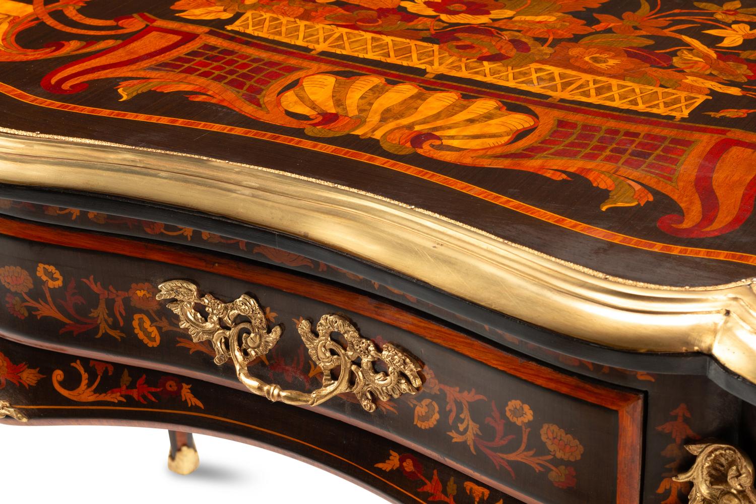 A Louis XV Style Gilt Bronze Mounted Marquetry Bureau Plat