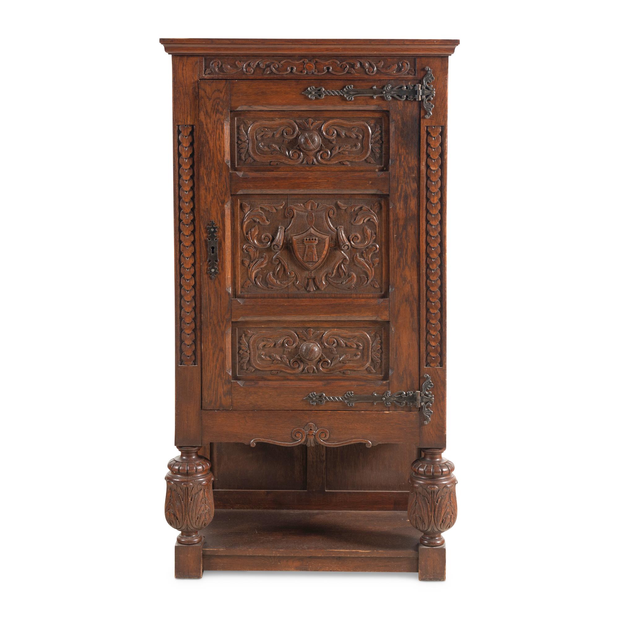 A Baroque Style Carved Oak Cabinet