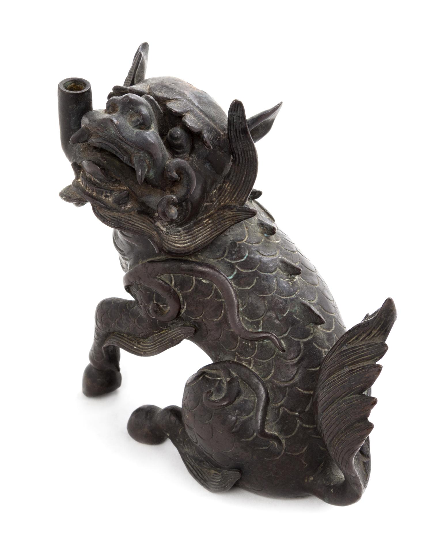 A Bronze Qilin- Form Candle Holder Length 7 inches. — 19TH CENTURY