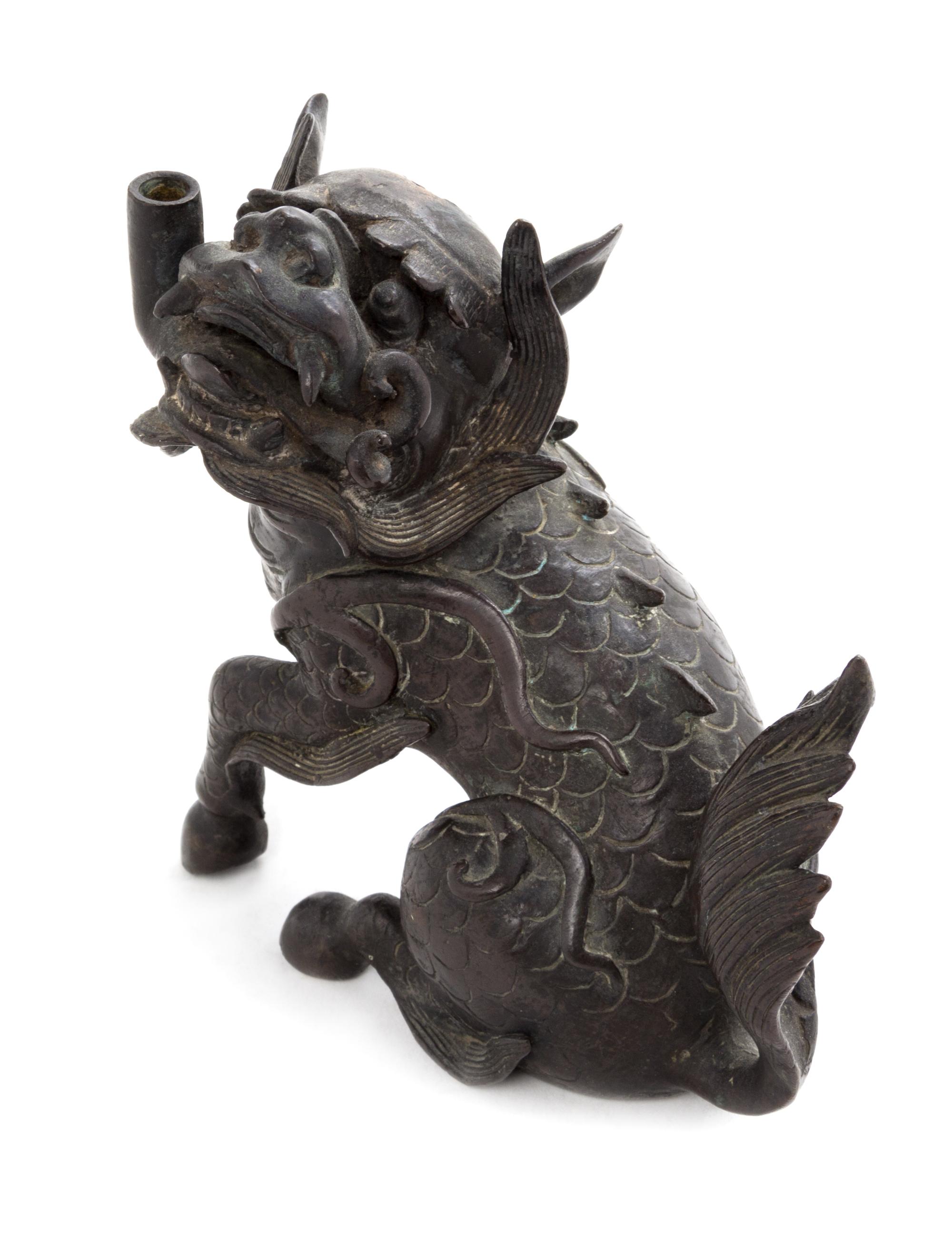 A Bronze Qilin- Form Candle Holder Length 7 inches. — 19TH CENTURY