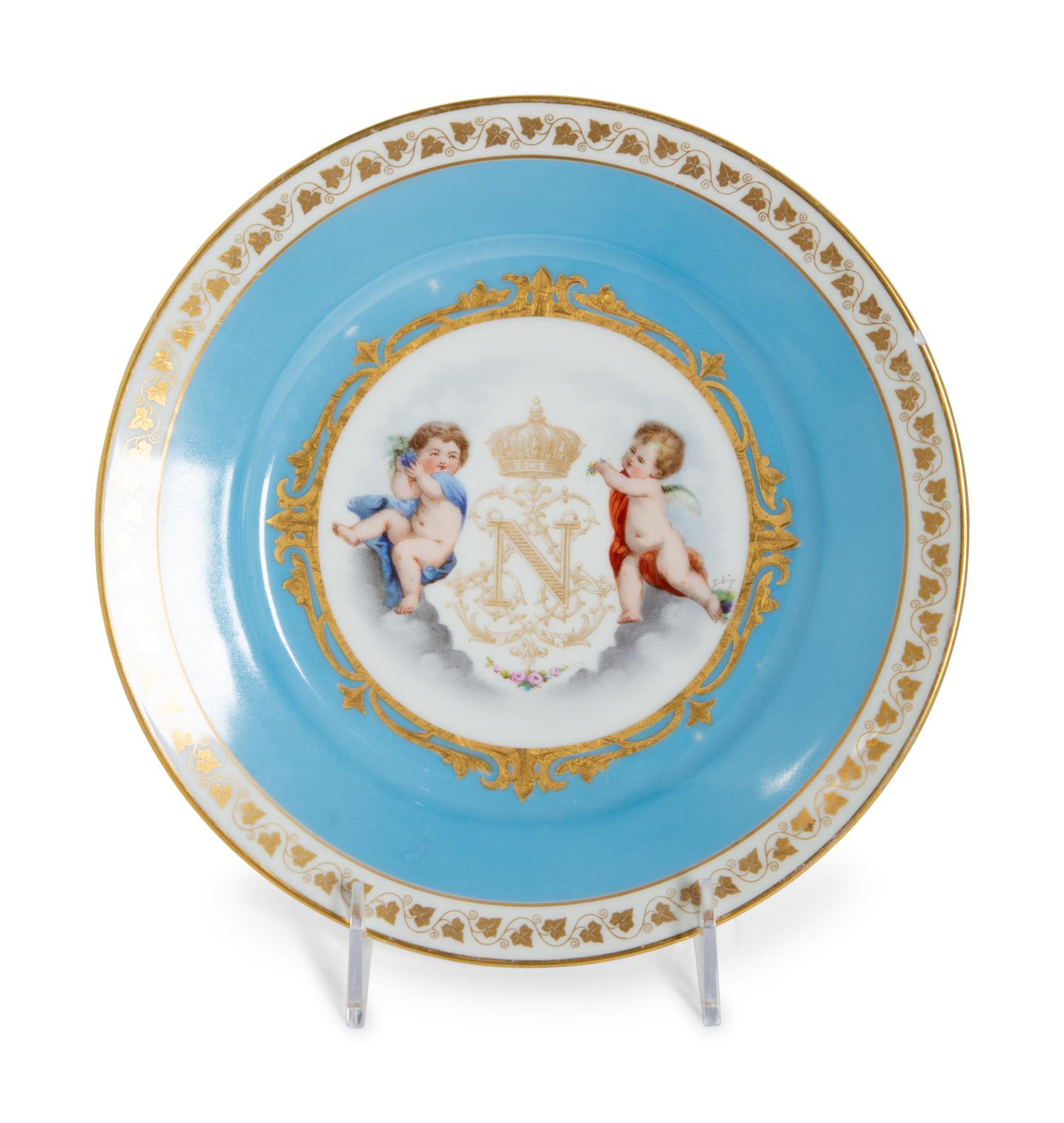 Three Sèvres Painted and Gilt Porcelain Cabinet Plates