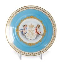 Three Sèvres Painted and Gilt Porcelain Cabinet Plates