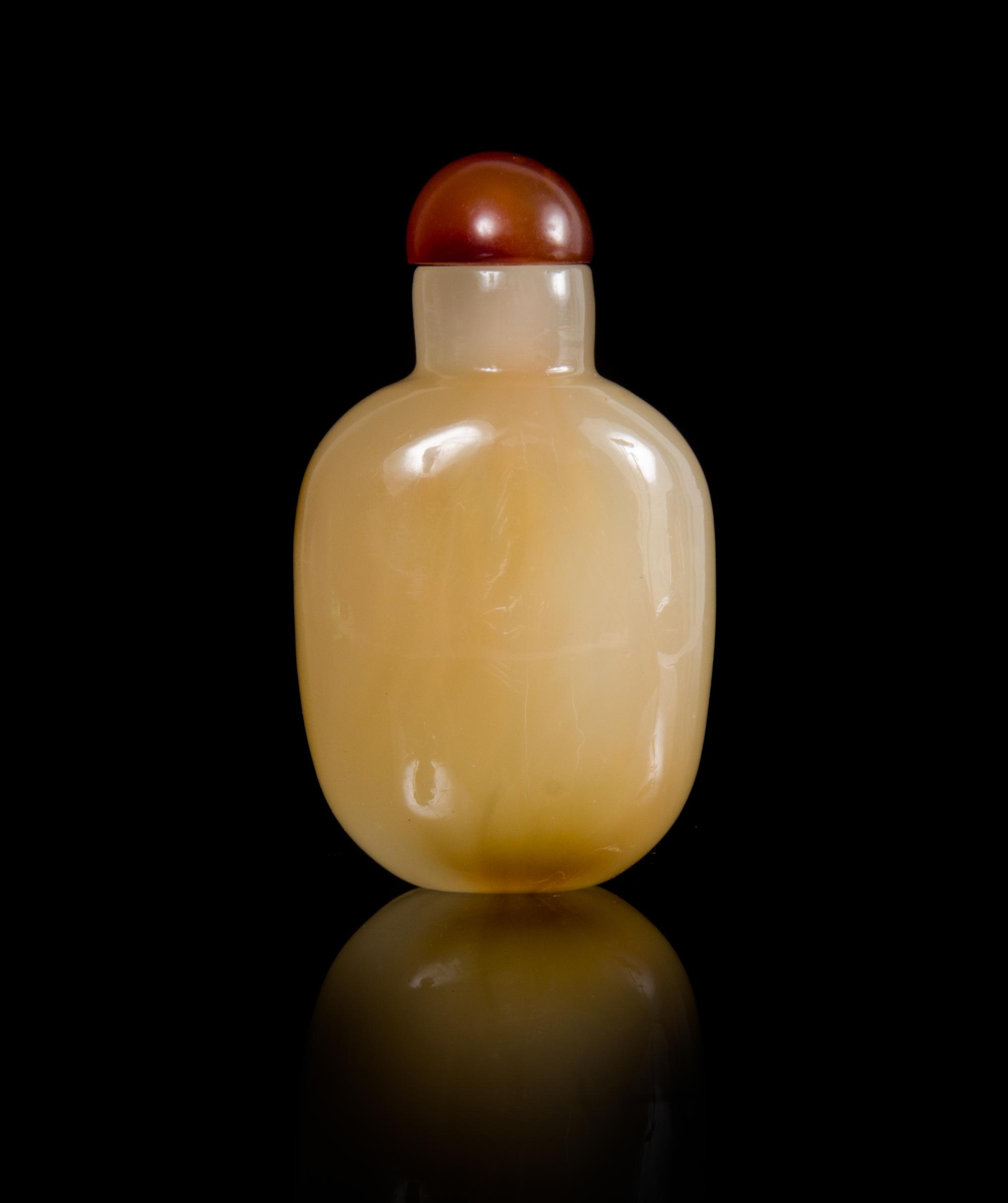 A Glass Imitating Agate Snuff Bottle Height 2 3/4 inches.