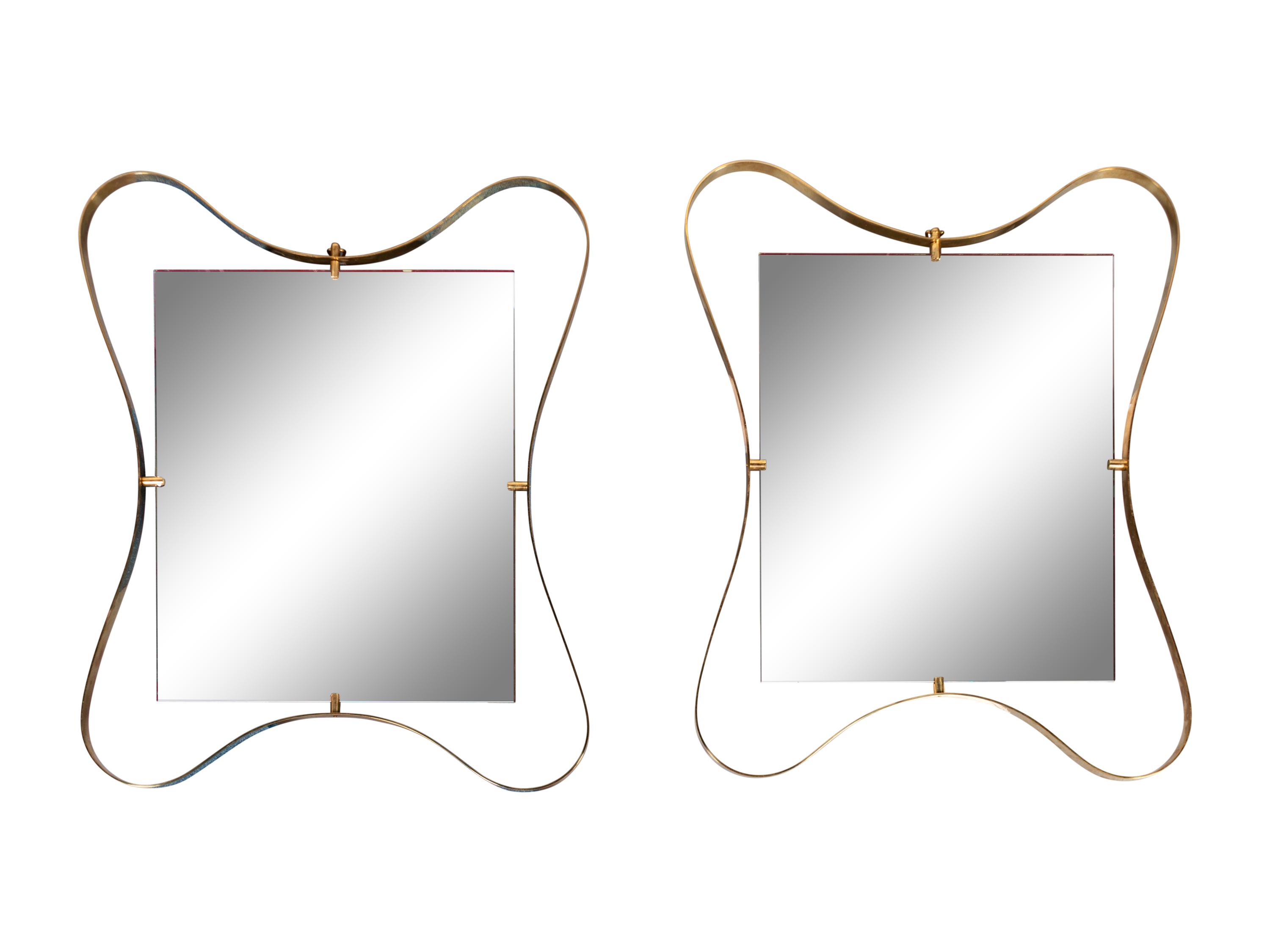 A Pair of Sculptural Mirrors