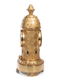 A Charles X Ormolu and Patinated Bronze Beehive Clock
