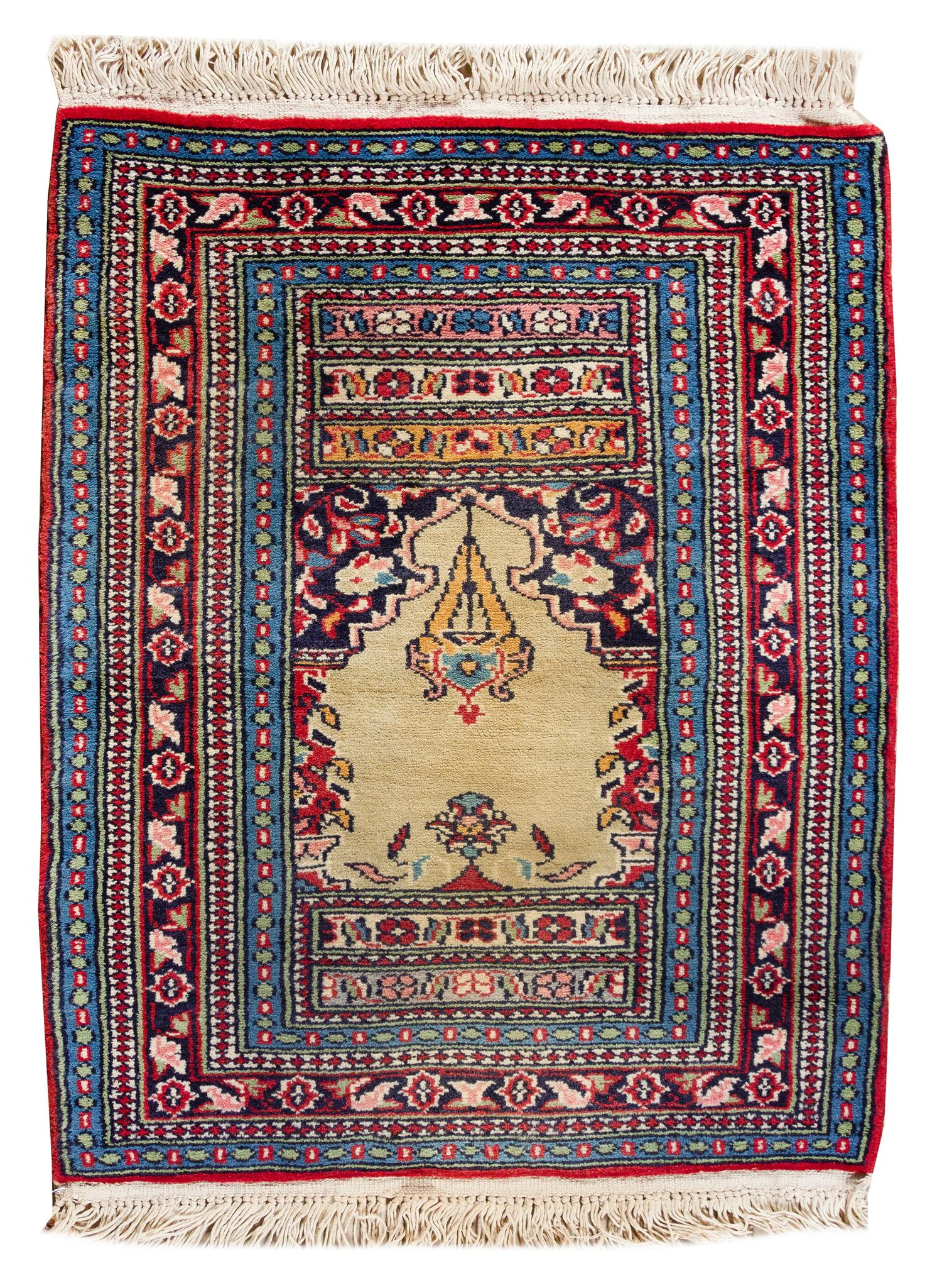 A Persian Wool Mat 2 feet 10 1/2 inches x 2 feet. — 20TH CENTURY