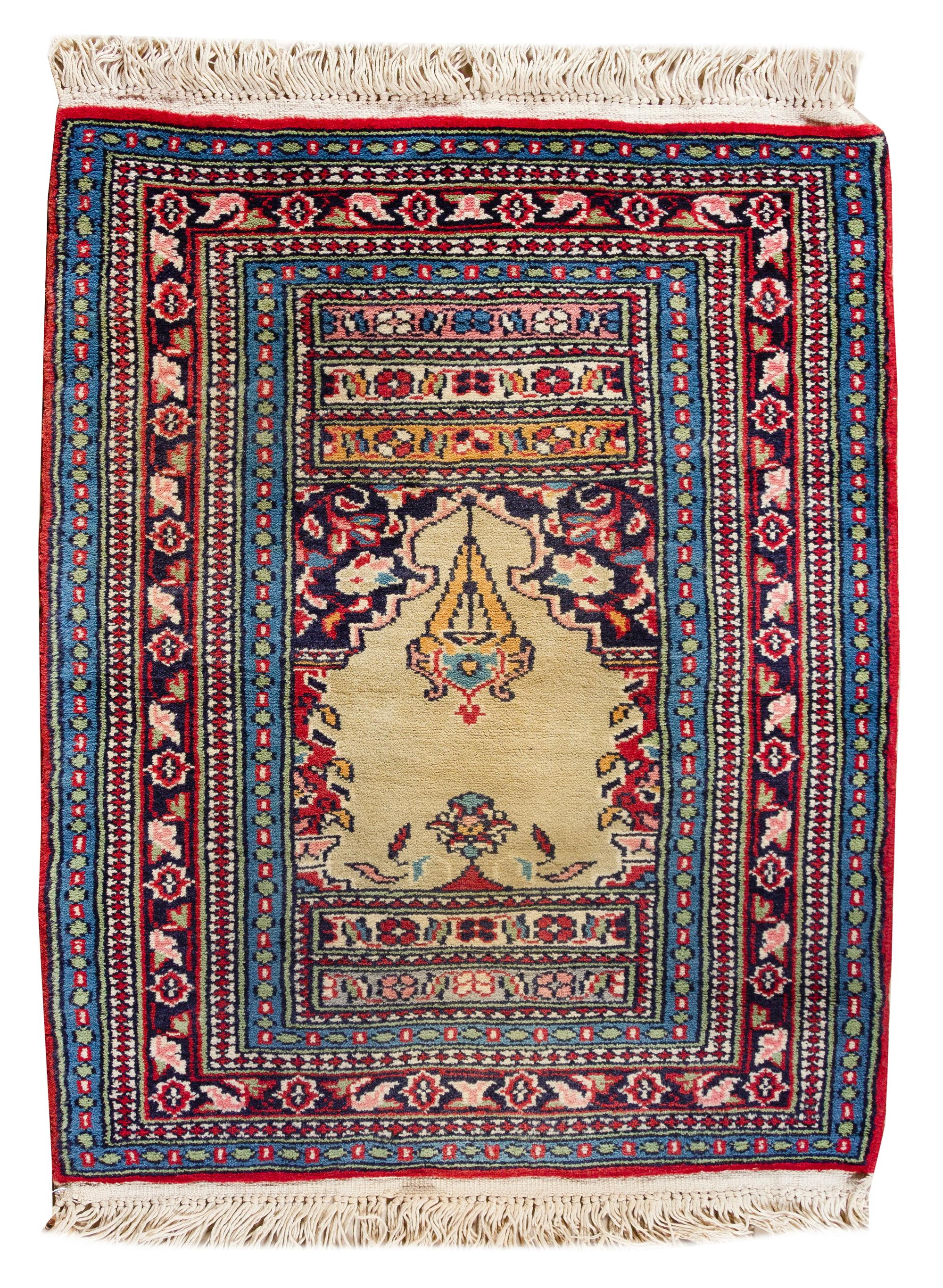A Persian Wool Mat 2 feet 10 1/2 inches x 2 feet. — 20TH CENTURY