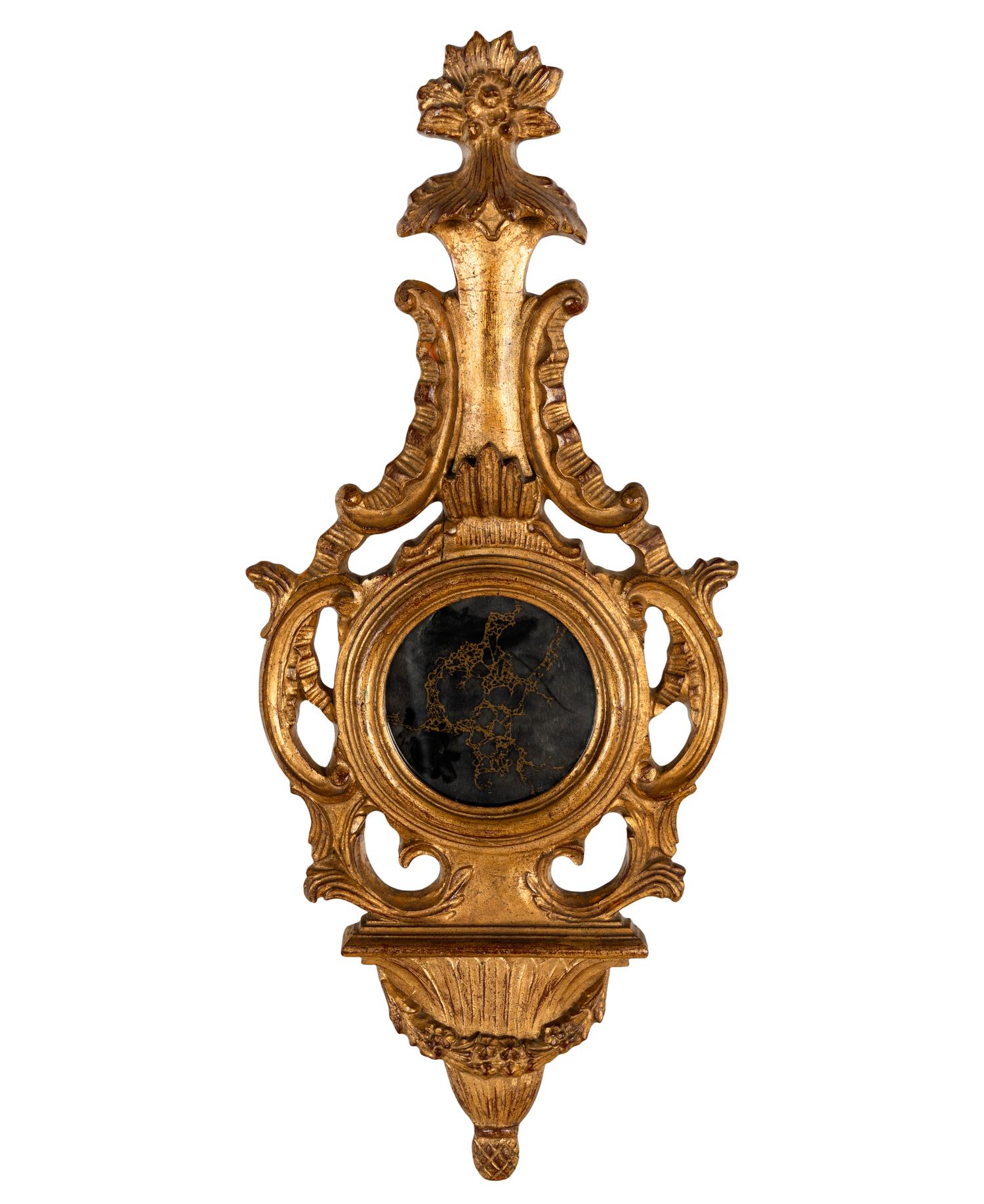 A Giltwood Banjo Form Wall Mirror