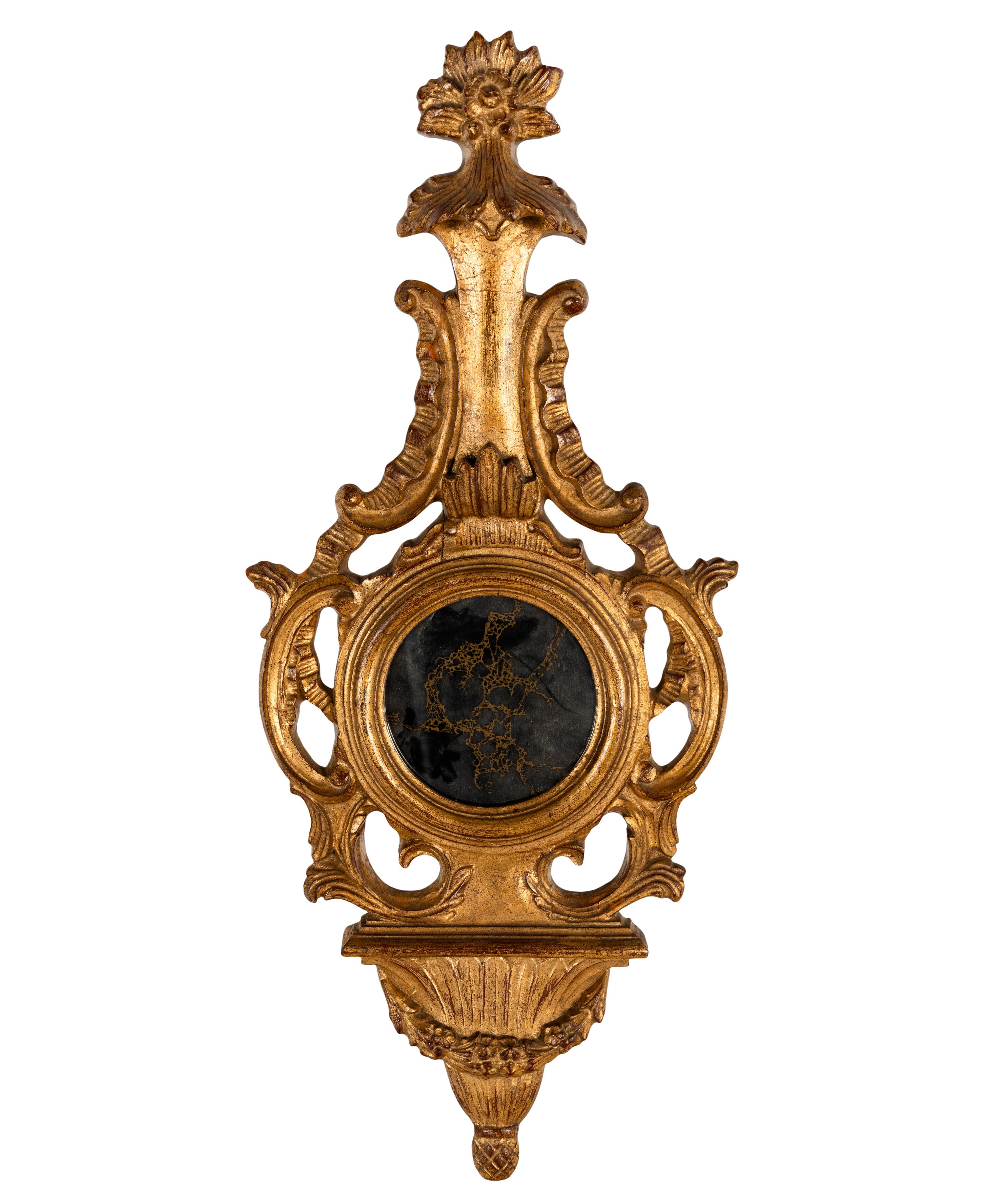 A Giltwood Banjo Form Wall Mirror
