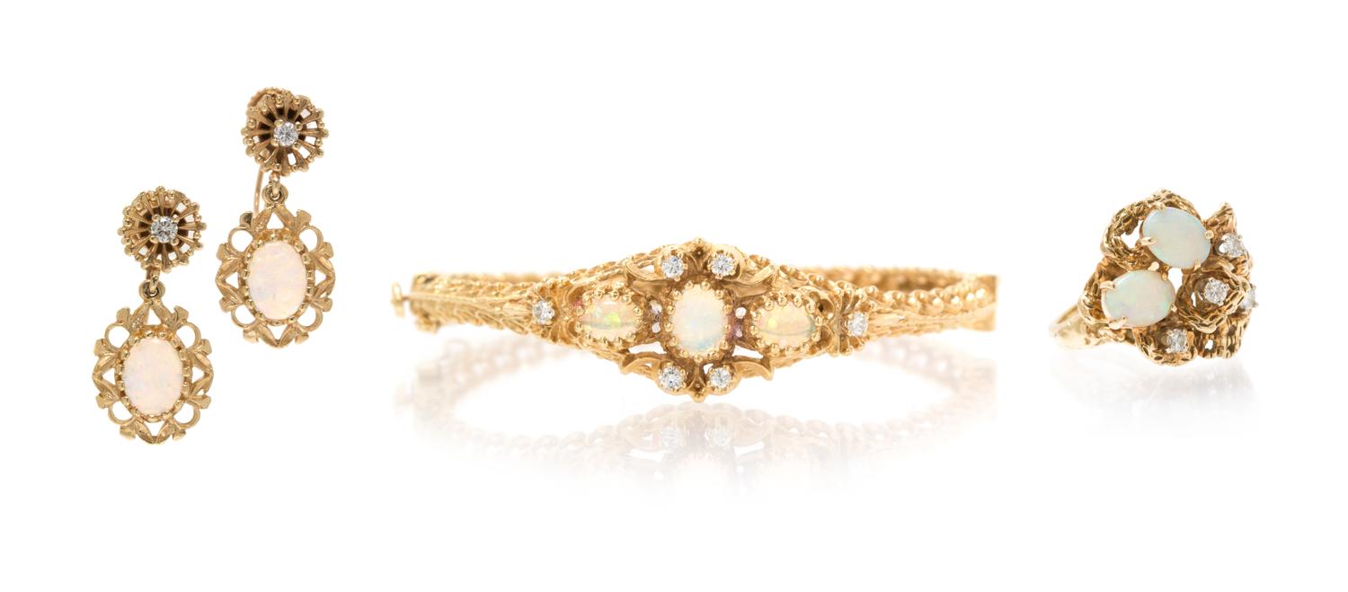 A Collection of Yellow Gold, Opal and Diamond Jewelry, 18.50 dwts.