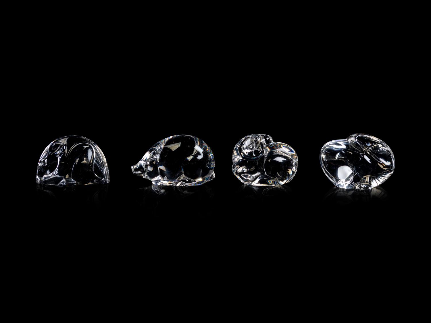 A Collection of Twelve Steuben Hand Coolers and Small Animals