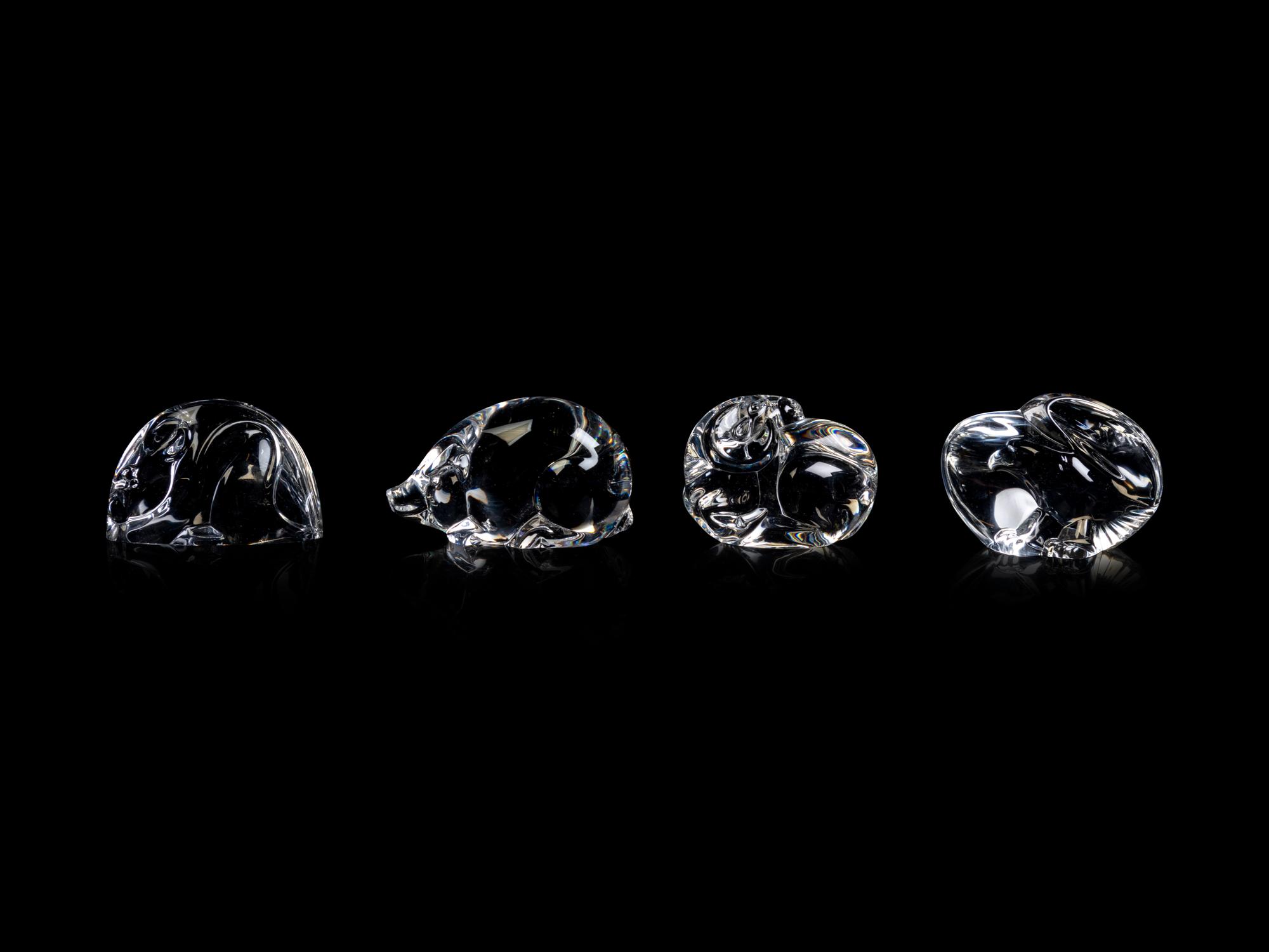 A Collection of Twelve Steuben Hand Coolers and Small Animals