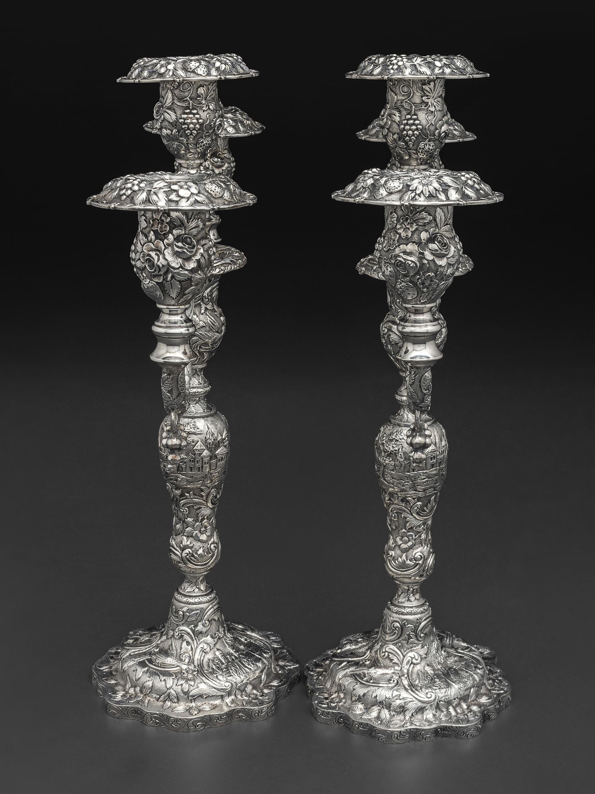 A Pair of American Repousse Silver Candelabra