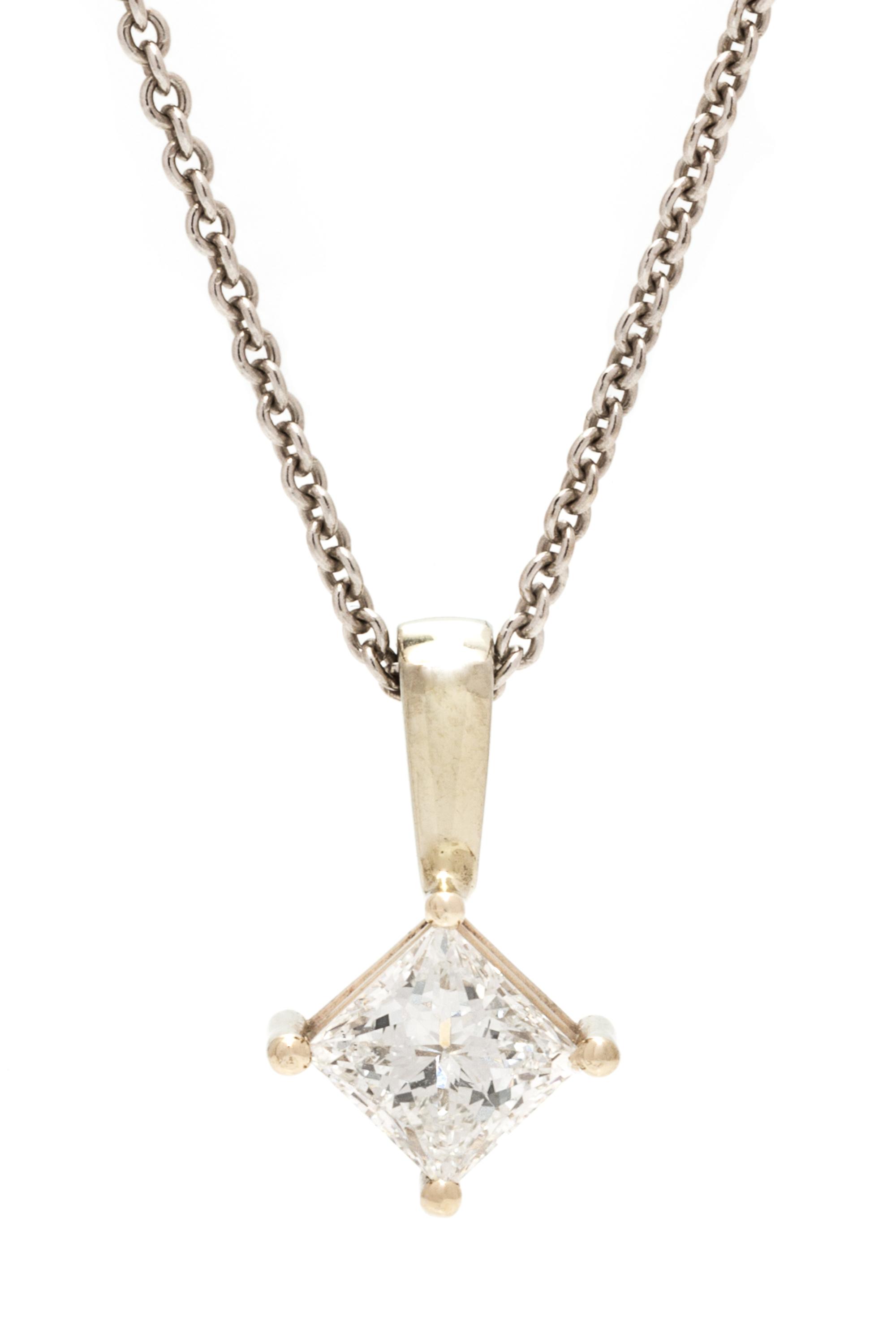 A White Gold and Diamond Pendant, 2.50 dwts