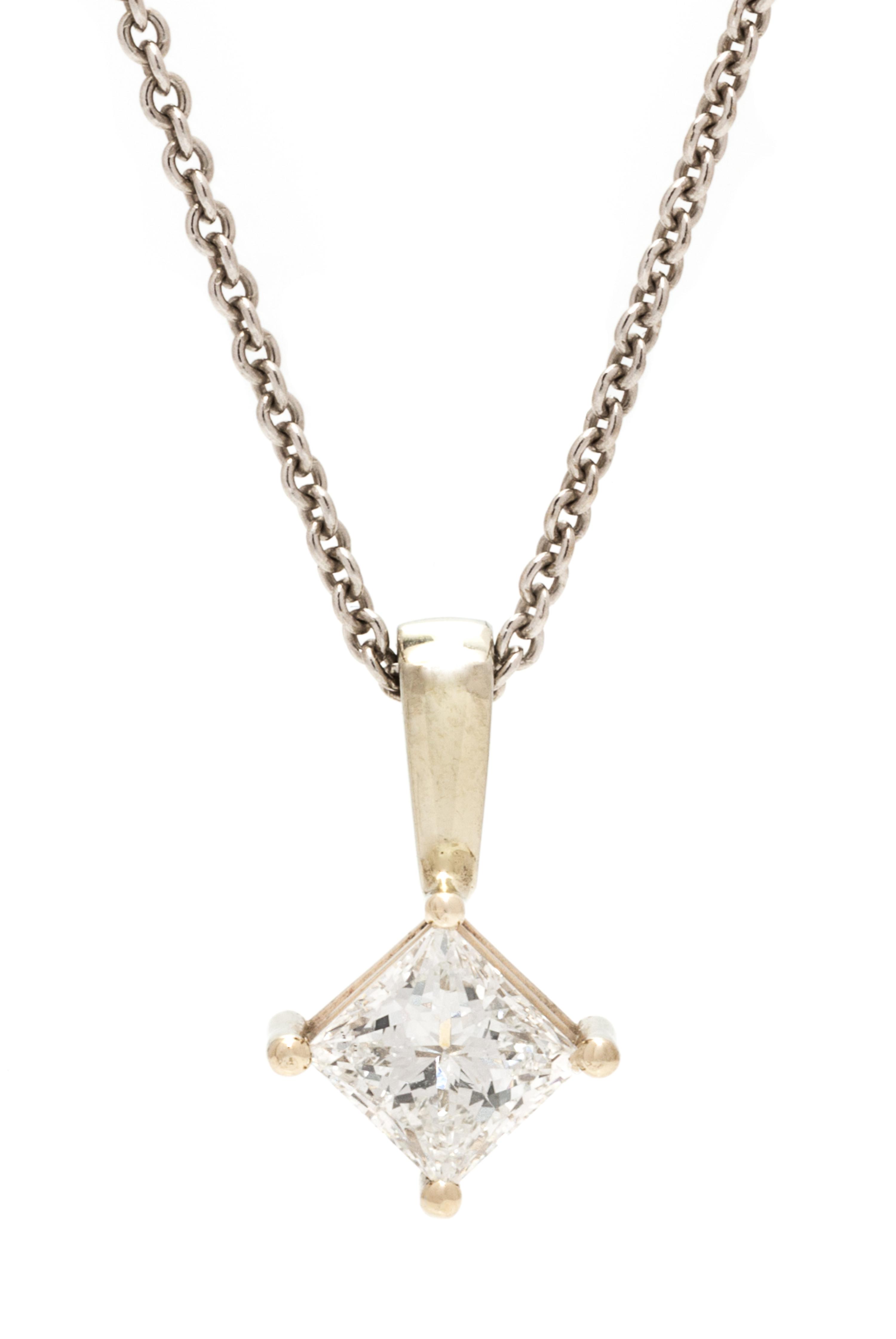 A White Gold and Diamond Pendant, 2.50 dwts