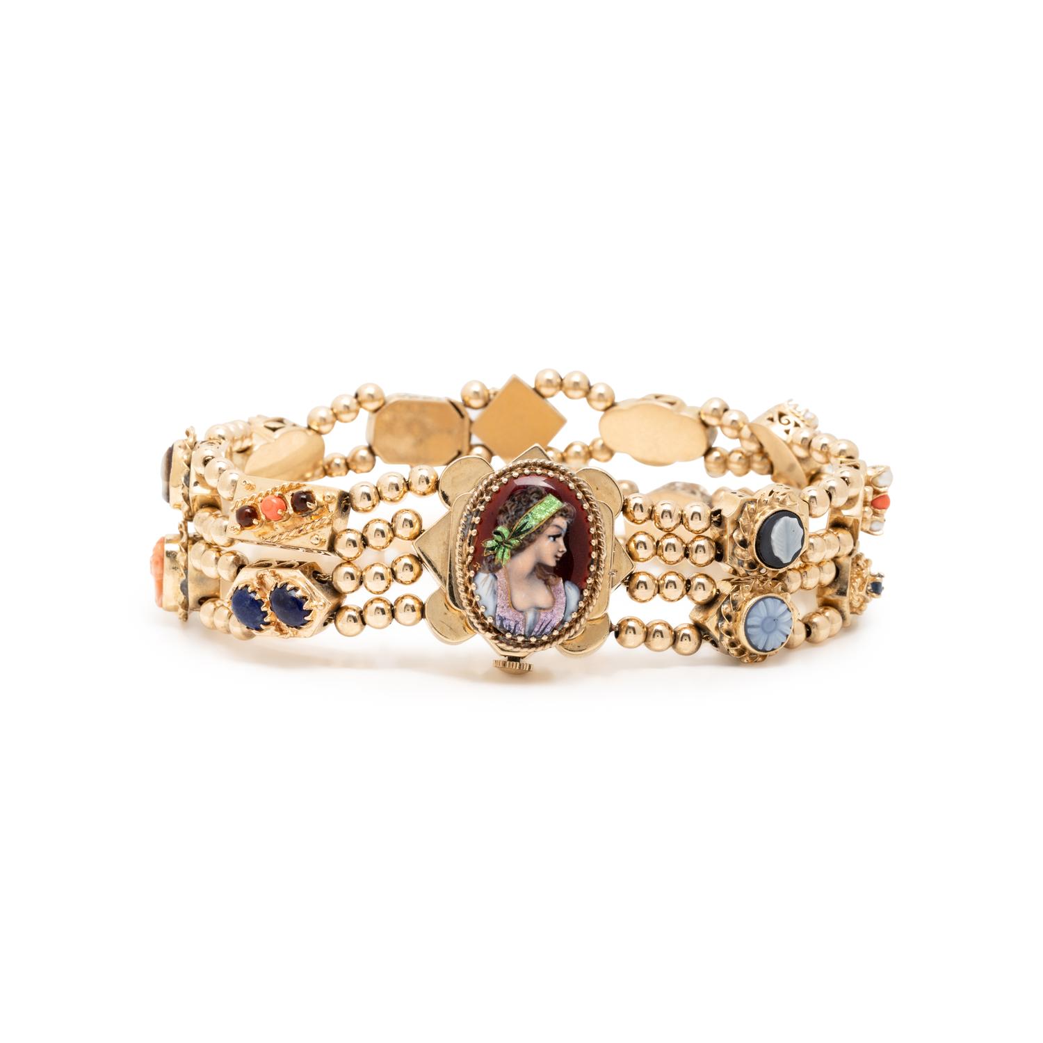YELLOW GOLD AND MULTIGEM SURPRISE WATCH