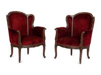 A Pair of Louis XV Style Walnut Bergères