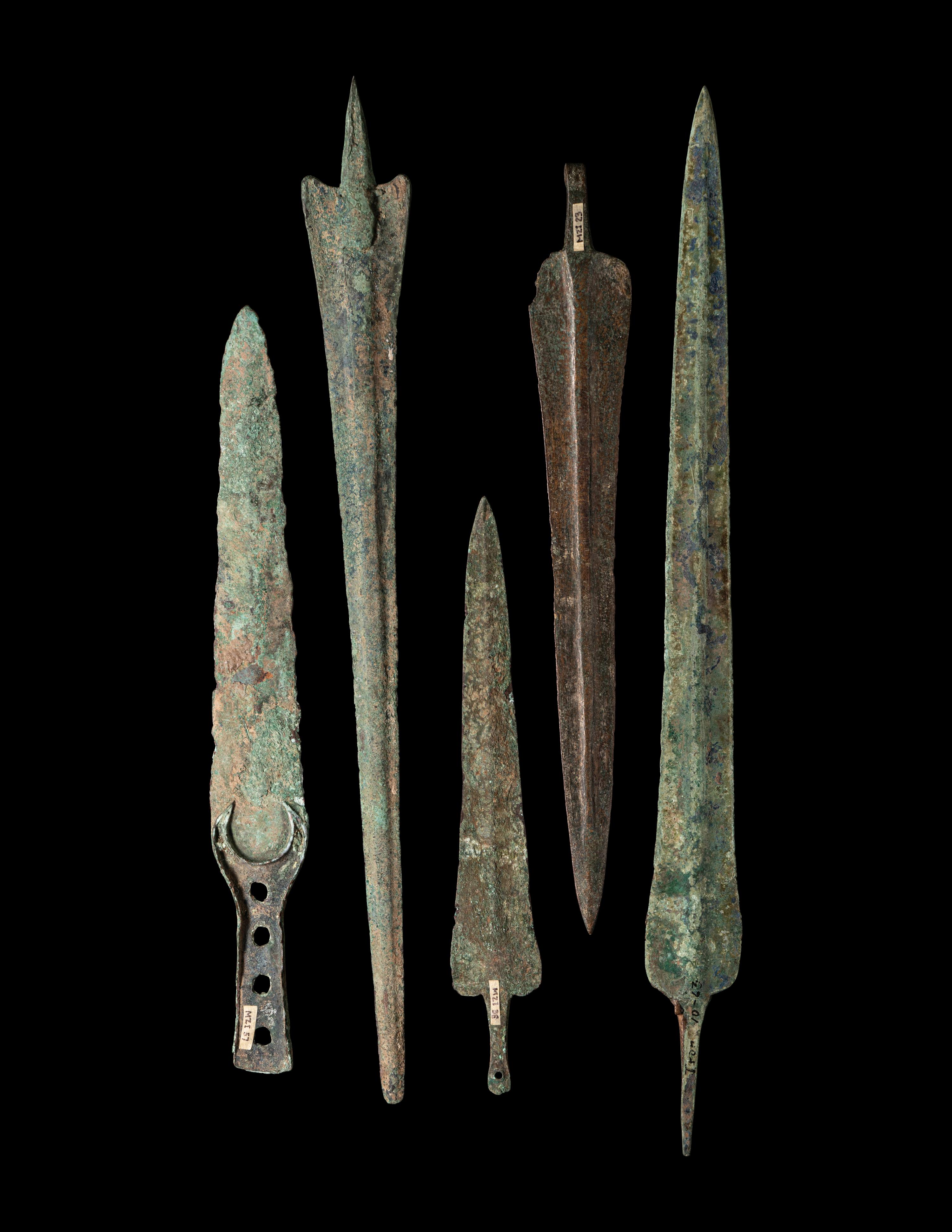 A Group of 5 Luristan Bronze Weapons Including Spearheads and a Sword