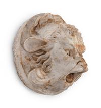 A Continental Carved Stone Grotesque Mask