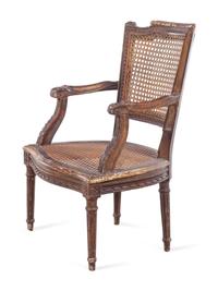 A Louis XVI Style Giltwood Child's Armchair