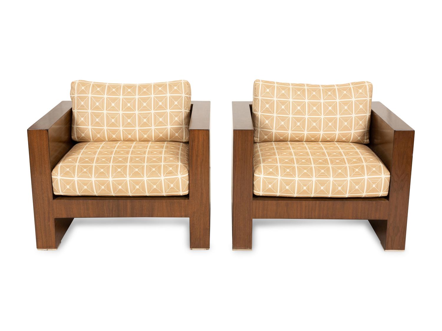 A Pair of Modernist Walnut Club Chairs