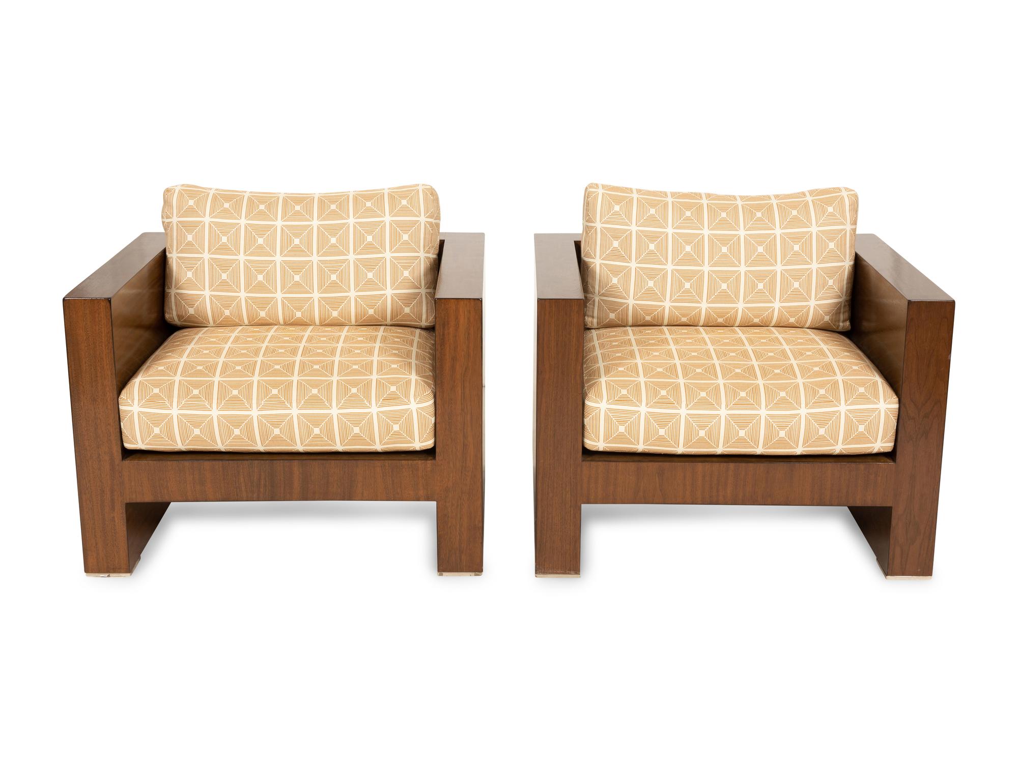 A Pair of Modernist Walnut Club Chairs