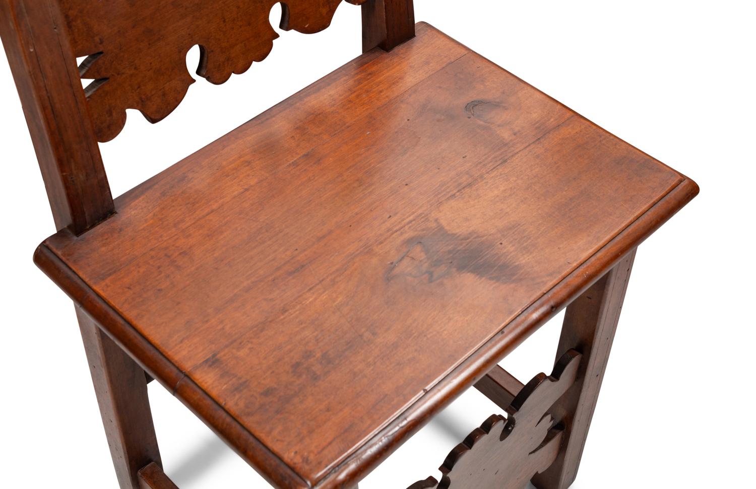 A Set of Eight Continental Baroque Style Walnut Chairs