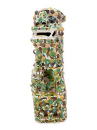 A Large Sancai Glazed Lion-Form Taperstick Holder