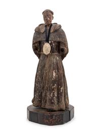 A Continental Carved and Painted Ecclesiastical Figure