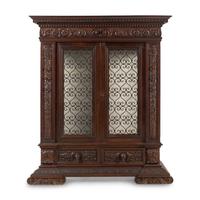 An Italian Renaissance Style Walnut and Wrought Iron Bookcase