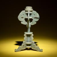 A Chinese Celadon Jade Hat Stand, 19th Century — 清晚期 青玉鏤雕夔龍紋冠架