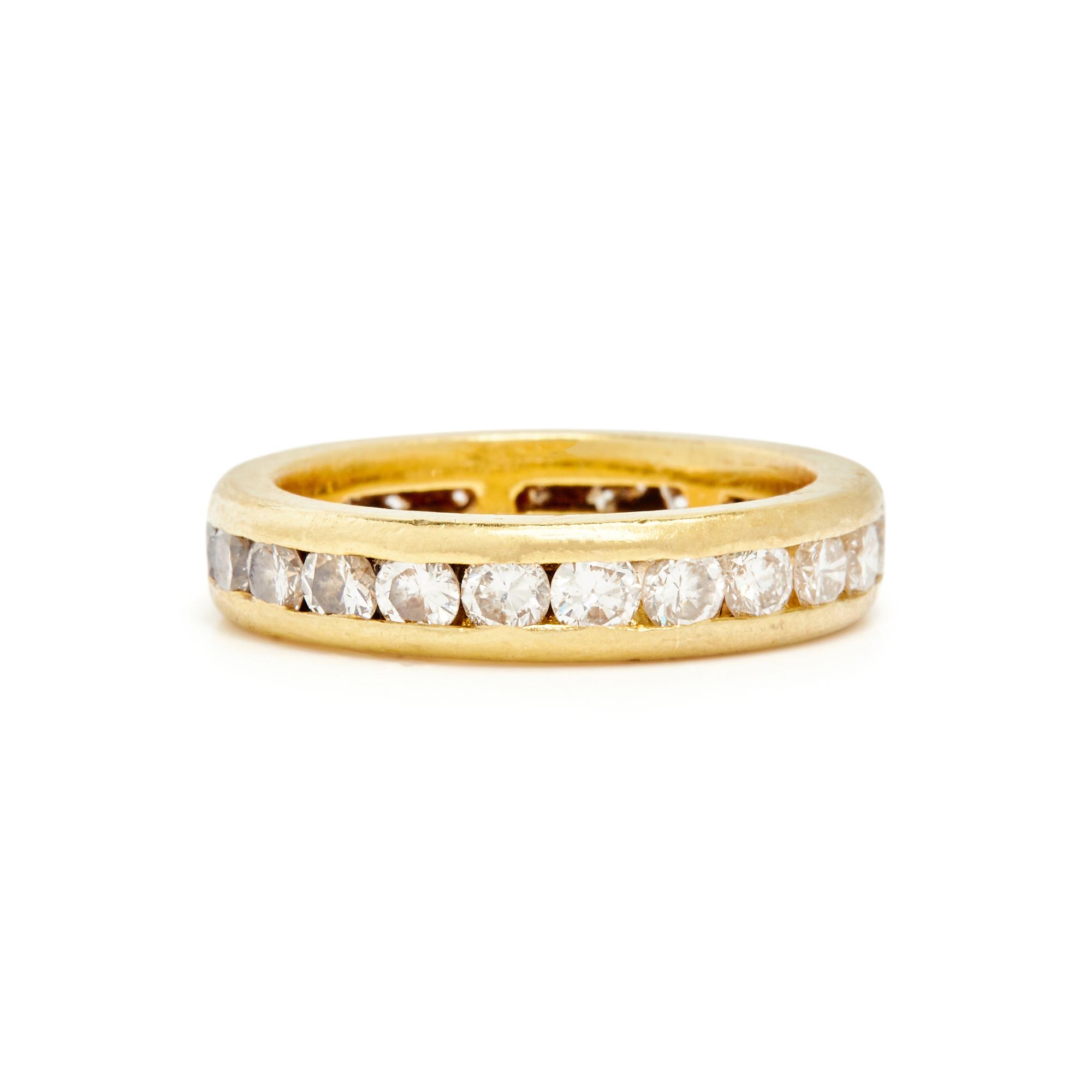 YELLOW GOLD AND DIAMOND ETERNITY BAND