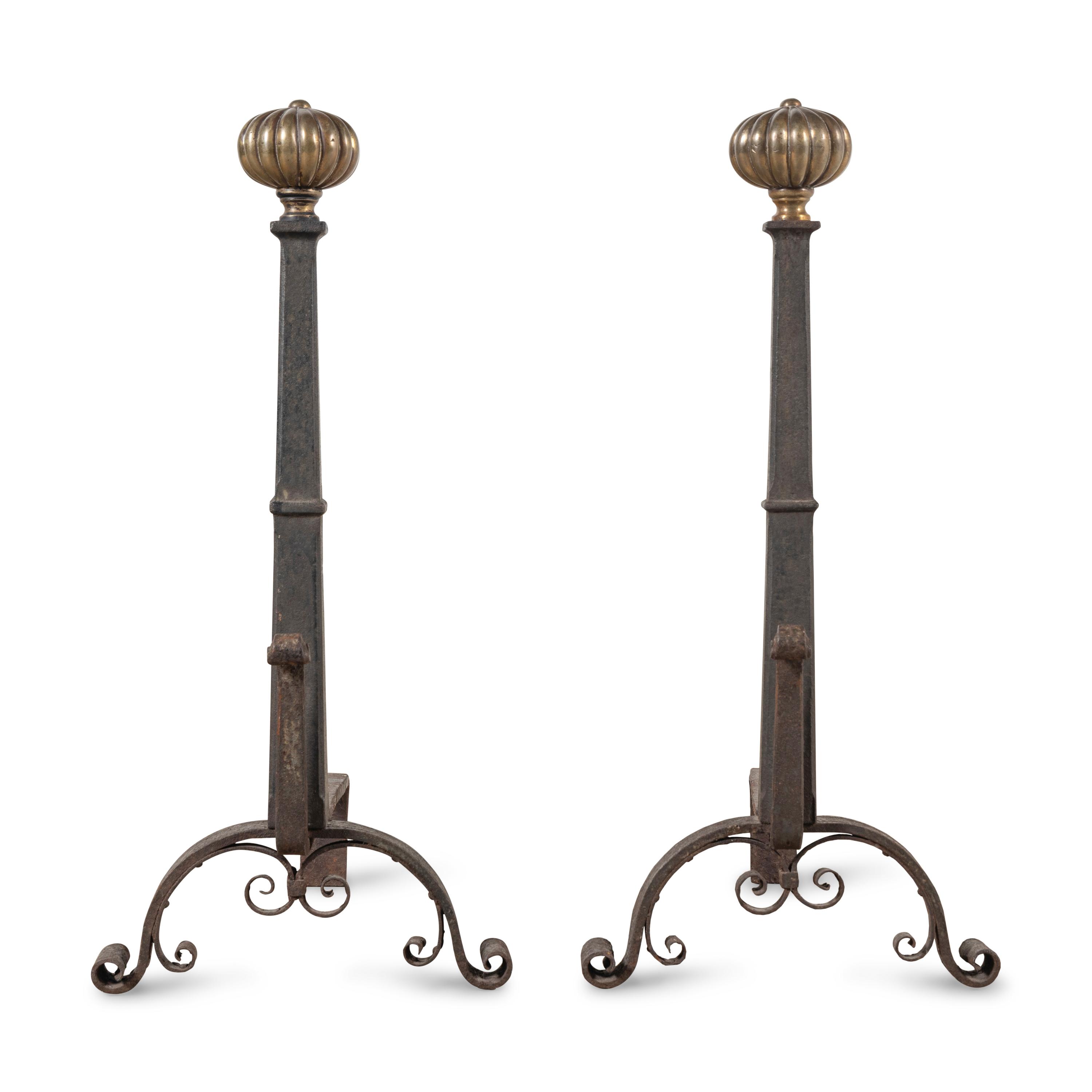 A Pair of Continental Iron and Brass Andirons