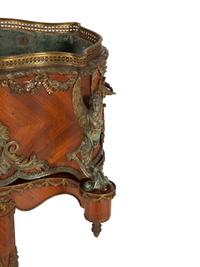 A Napoleon III Gilt Metal Mounted Kingwood Jardinière and Stand