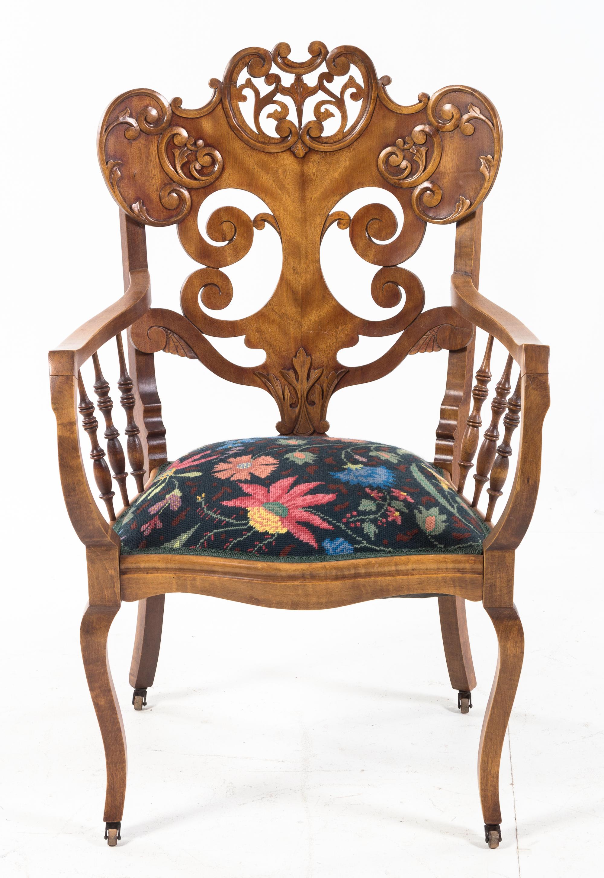 A Victorian Walnut Needlepoint Armchair Height 36 5/8 inches. — EARLY 20TH CENTURY