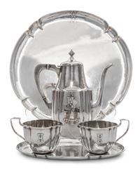 An American Arts and Crafts Silver Tea Service, Falick Novick, Chicago, IL, Early 20th Century, comprising a teapot, a creamer, a sugar