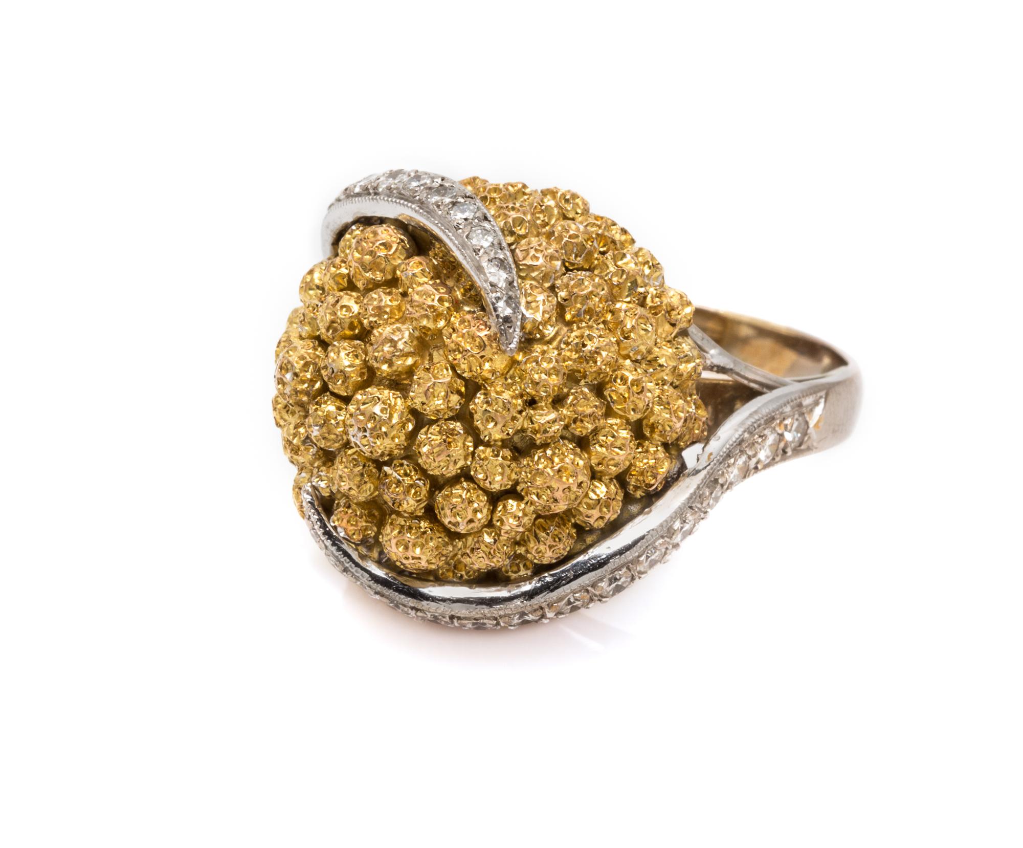 An 18 Karat Two Tone Gold and Diamond Ring, 15.00 dwts.