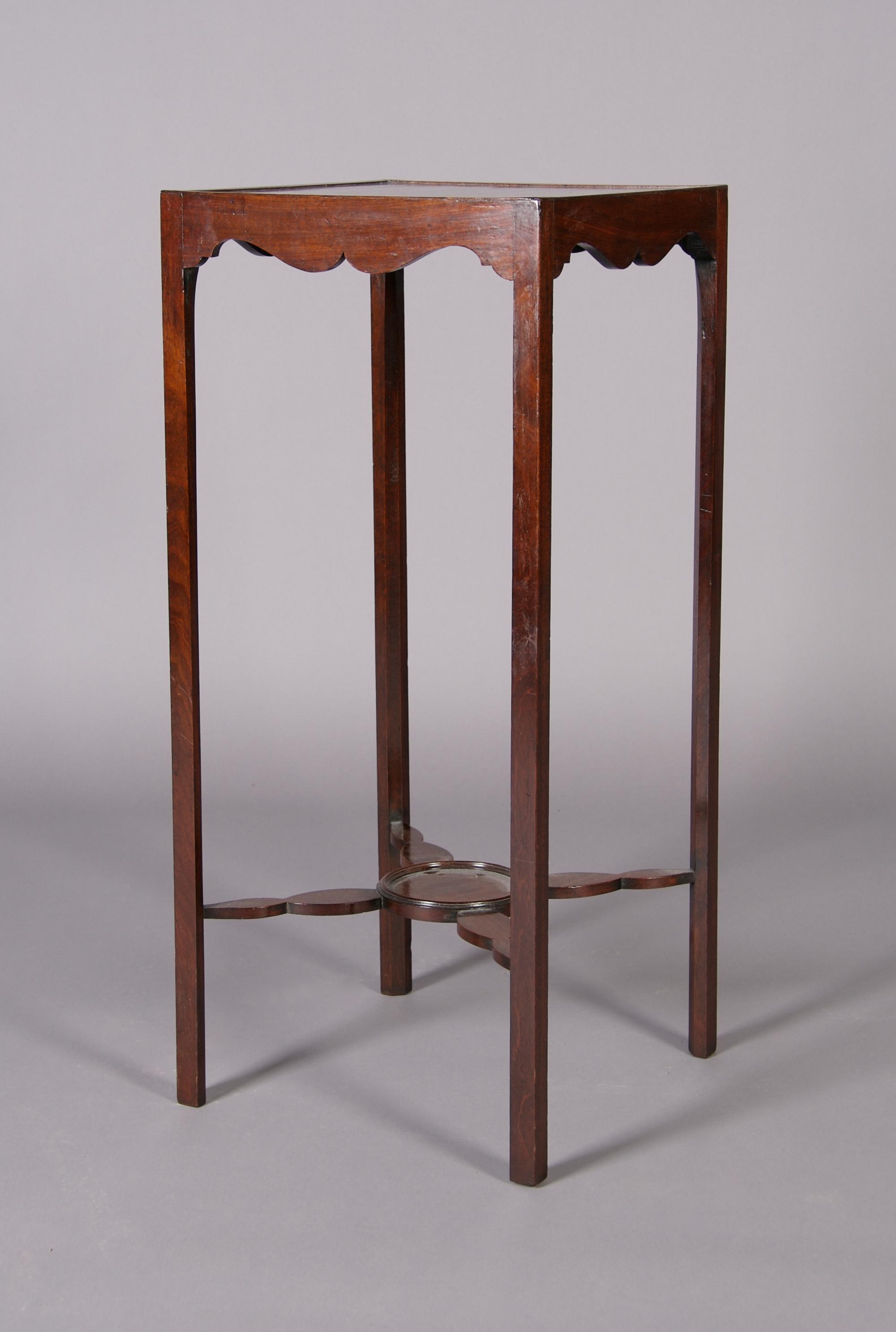 An English Mahogany Urn Stand, Height 31 3/4 x width 14 x depth 14 inches.